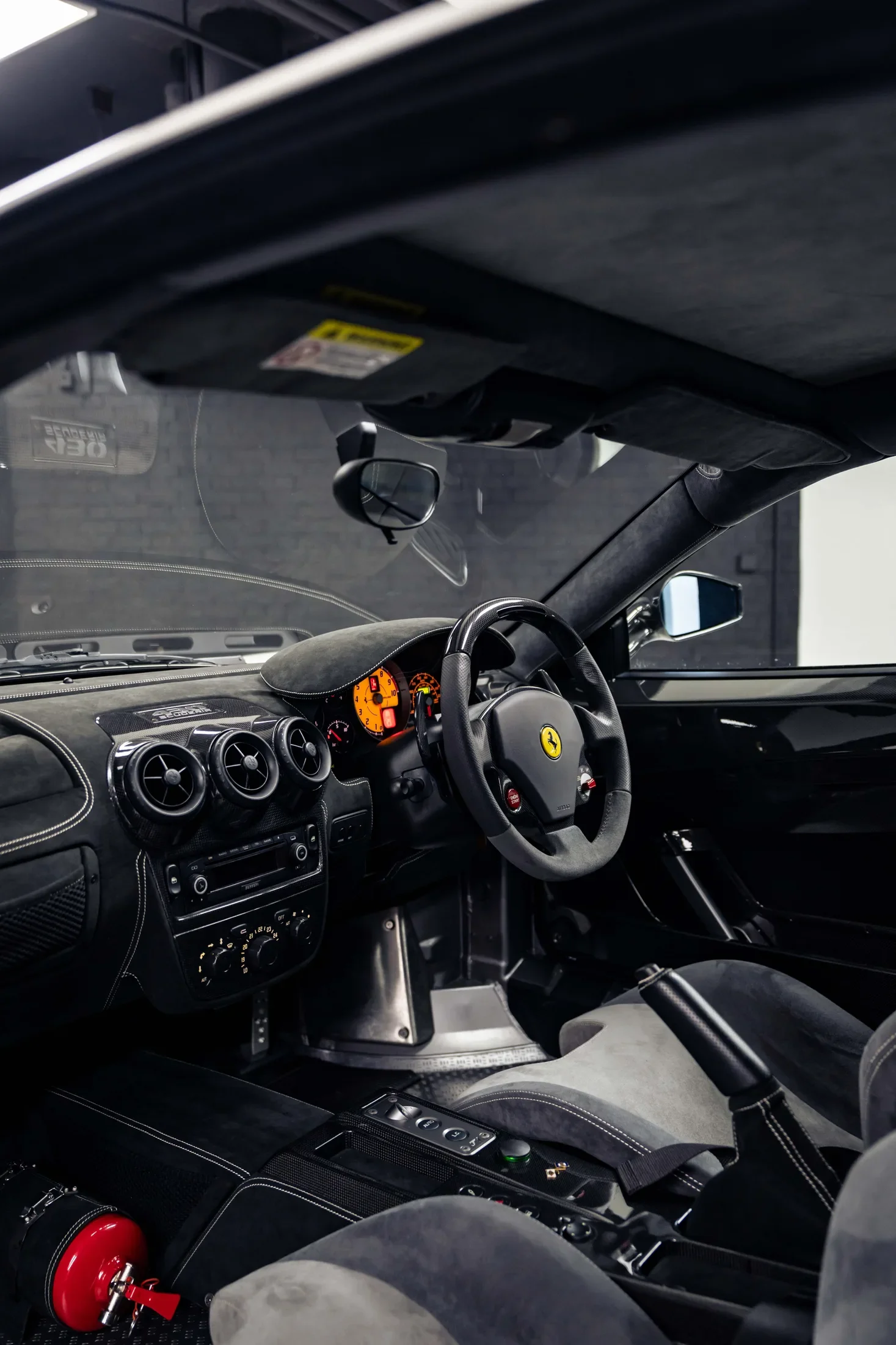 Ferrari 430 Scuderia in Bianco Avus — Steering wheel and cockpit — AKC Asset Management.
