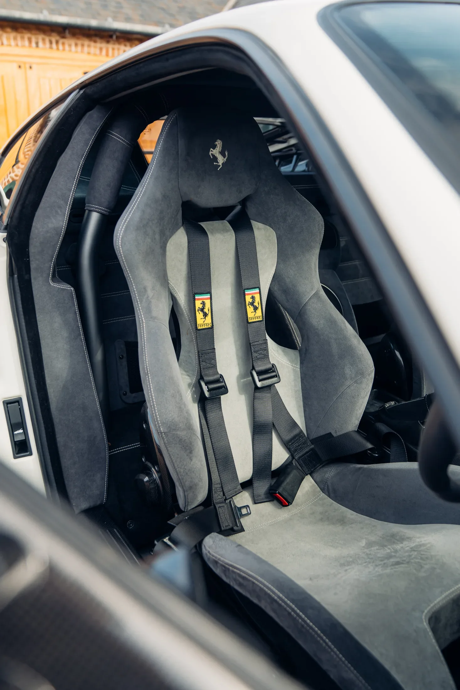 Ferrari 430 Scuderia in Bianco Avus — Black racing seat and harness — AKC Asset Management.