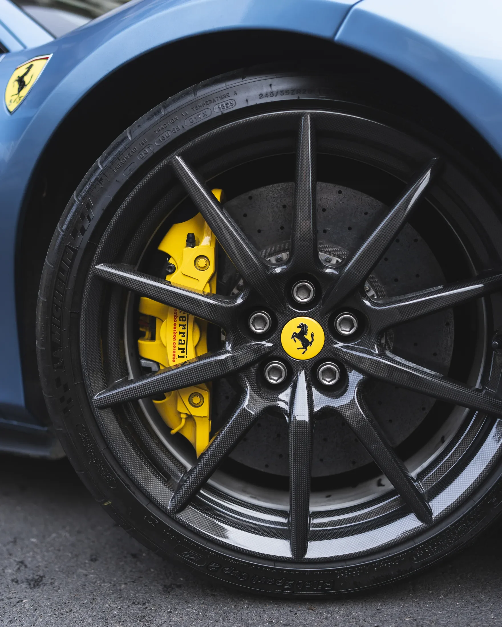 Ferrari 488 Pista in Azzurro California — Carbon wheel and yellow brake caliper — AKC Asset Management.