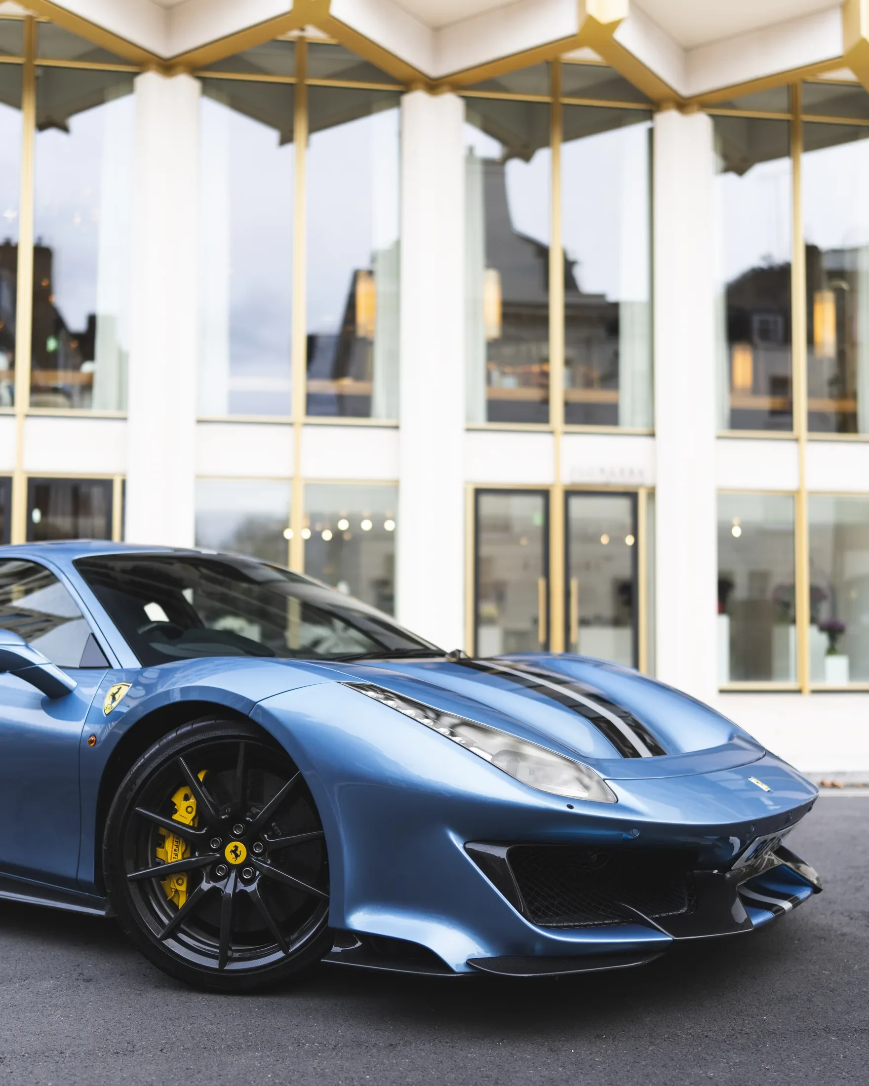 Ferrari 488 Pista in Azzurro California — Front three-quarter view with the engine cover raised — AKC Asset Management.