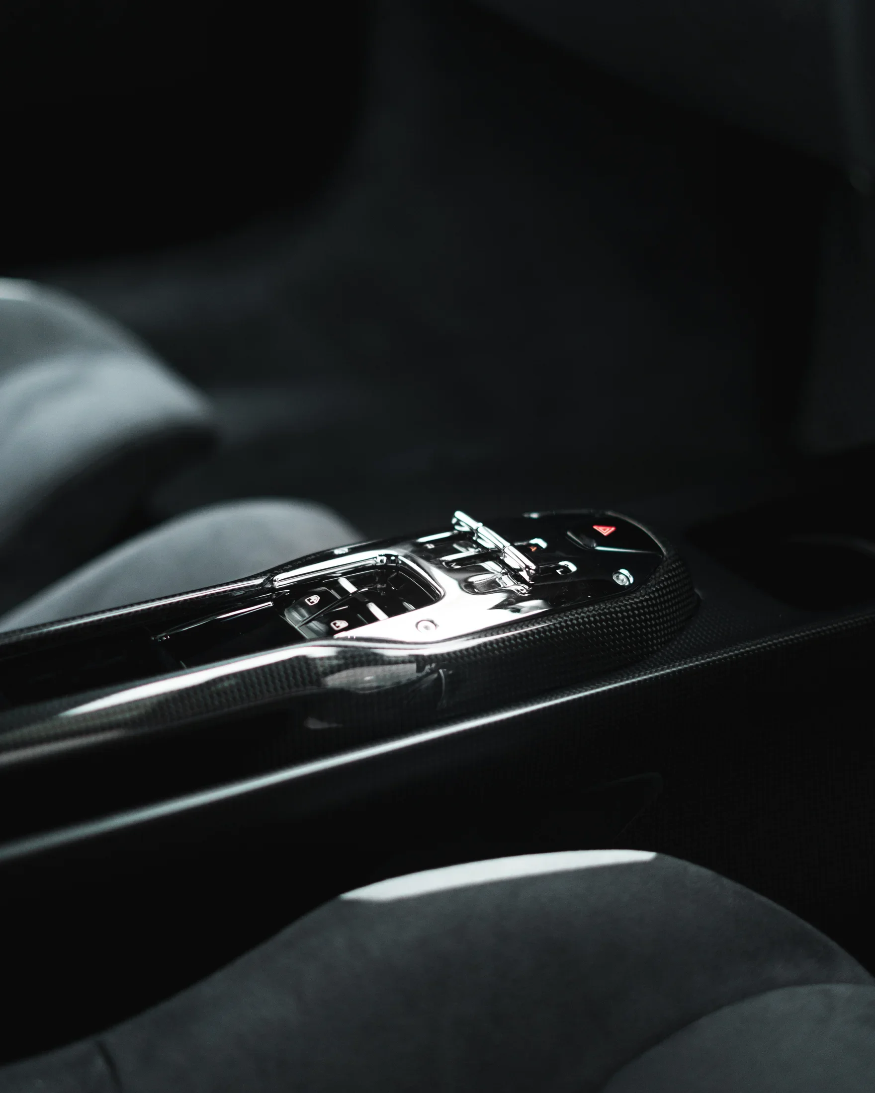 Ferrari 296 Speciale in Argento Nürburgring — Carbon-fibre centre console and controls — AKC Asset Management.