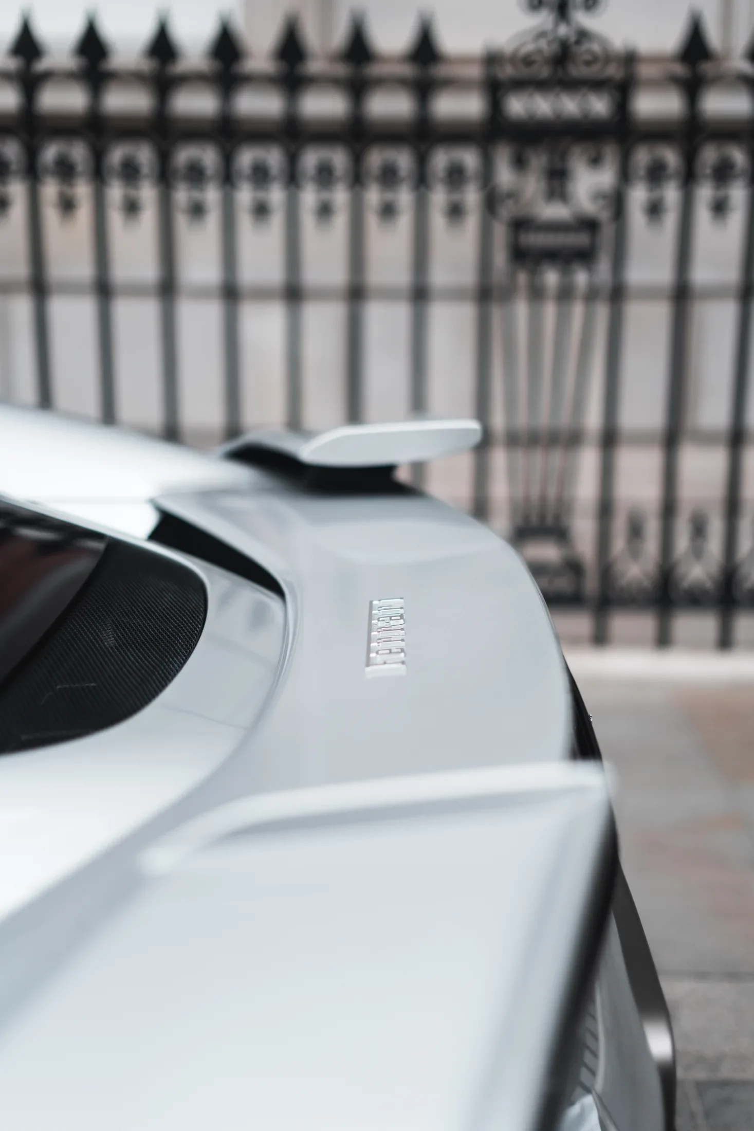 Ferrari 296 Speciale in Argento Nürburgring — Rear spoiler detail — AKC Asset Management.