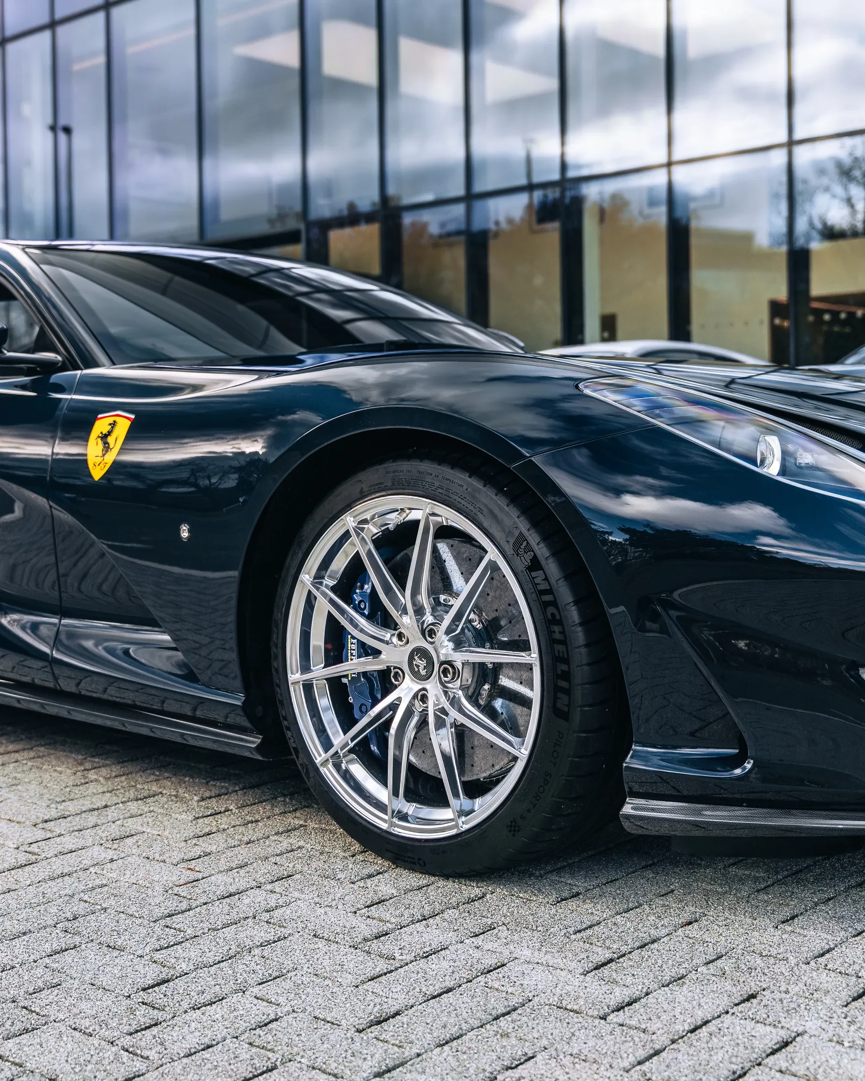 Ferrari 812 Superfast in Blue Pozzi — Chrome front wheel and painted shield — AKC Asset Management.