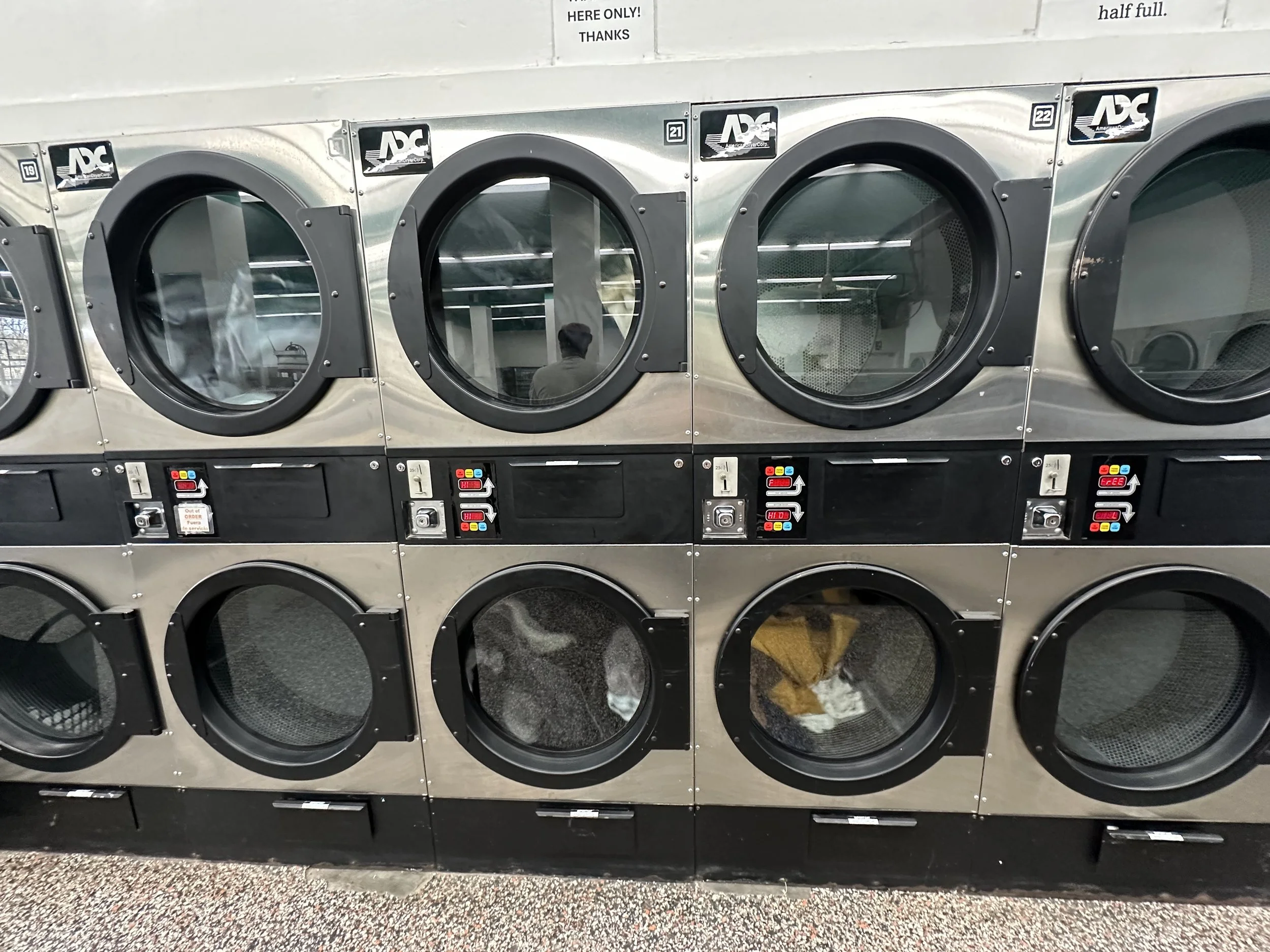 Large-capacity dryers at State Avenue Coin Laundry in Kansas City, KS featuring free drying with every wash and weekday wash savings.