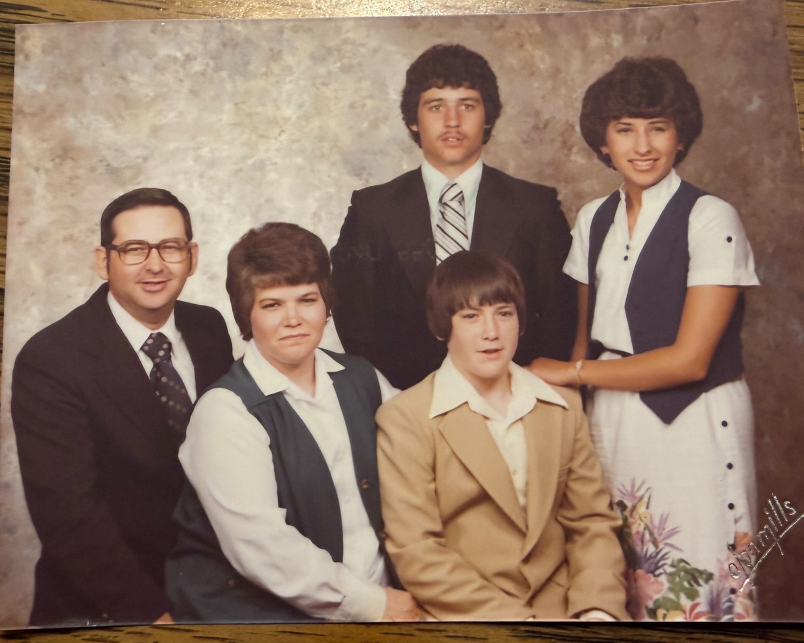 Marcia Krites with her parents and two brothers in a family portrait.
