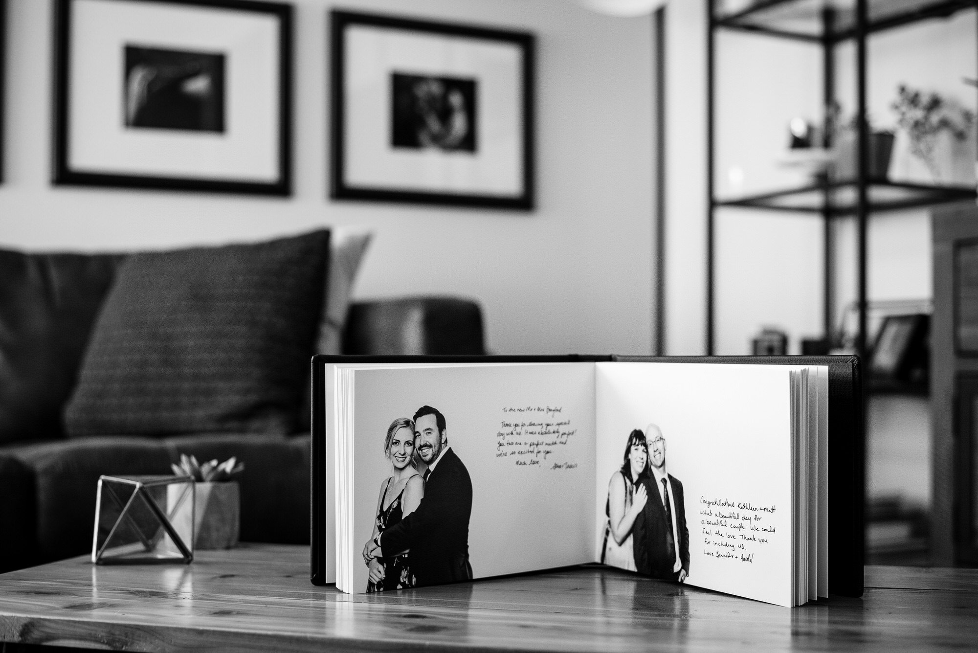 black and white portraits in a wedding guestbook with handwritten messages from guests