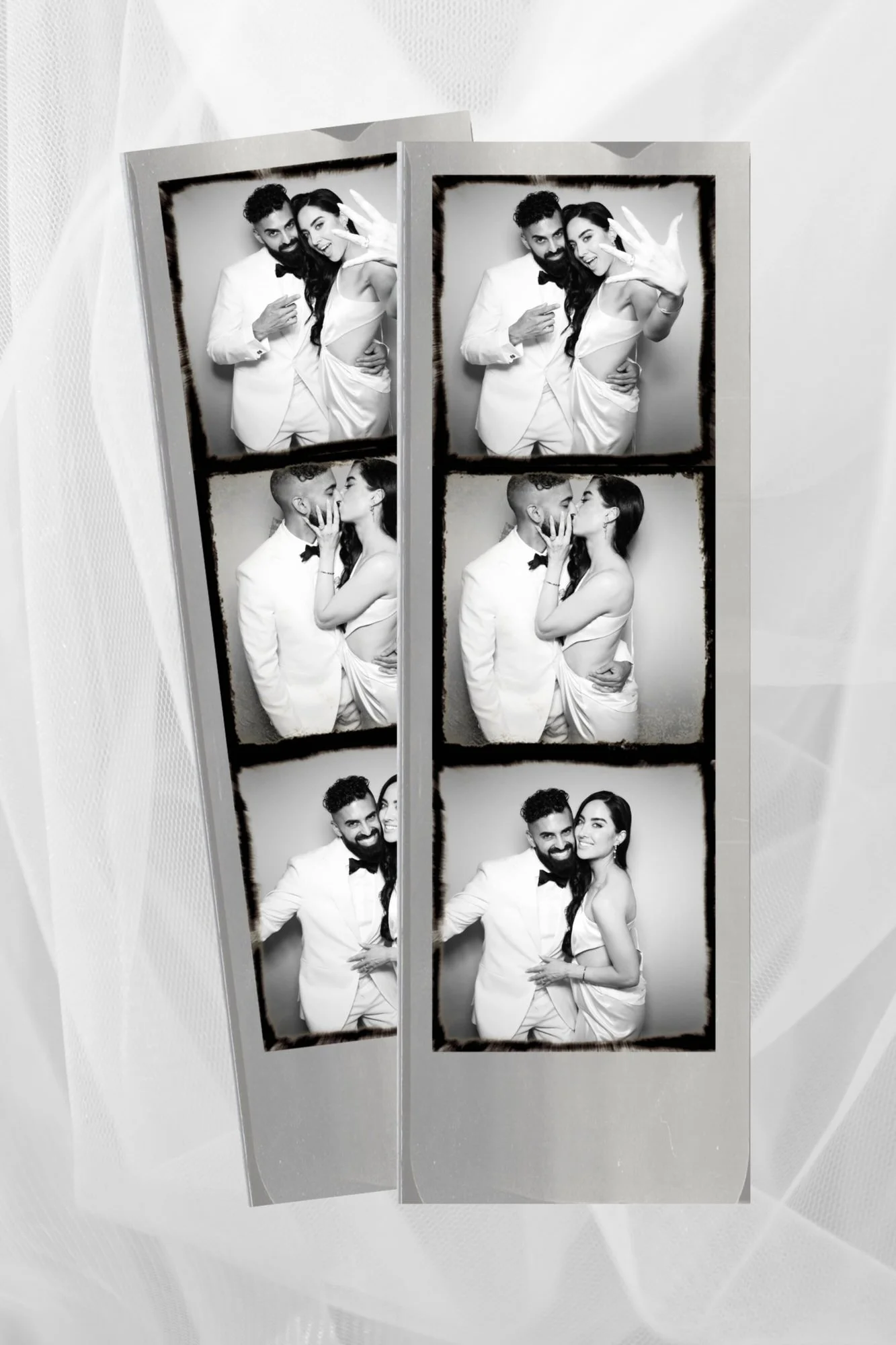 photo strips from an enclosed vintage photo booth on a white lace veil