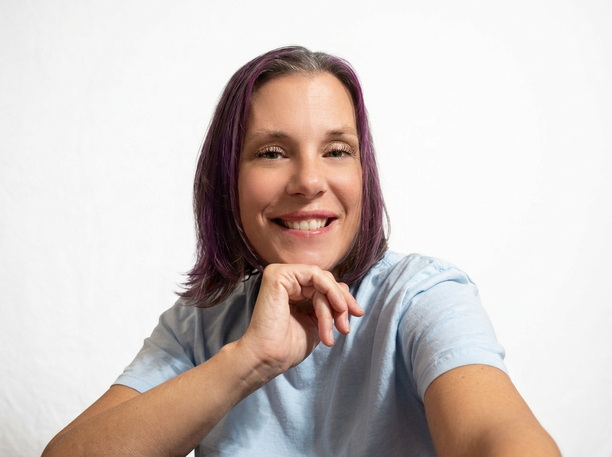 Professional photo of Angela Allen, LPC, therapist and owner of Angie Allen Counseling, a virtual therapy practice serving adults and athletes throughout Texas.