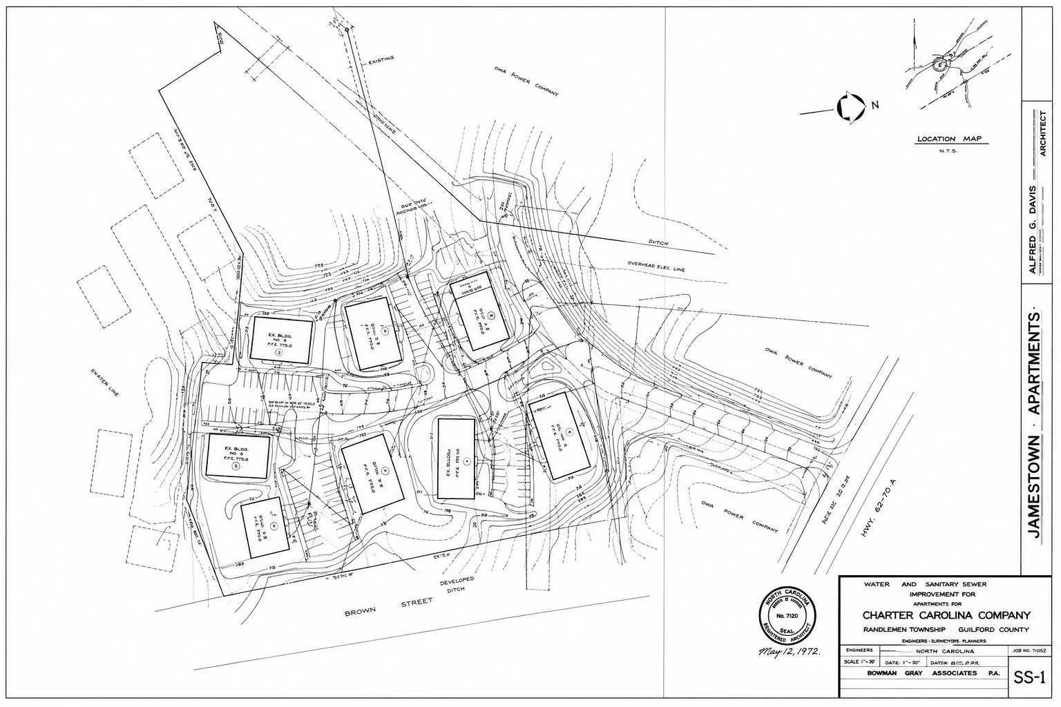 Site plan for an apartment development with multiple buildings, parking area, roadways, and surrounding contour lines, dated May 12, 1972.