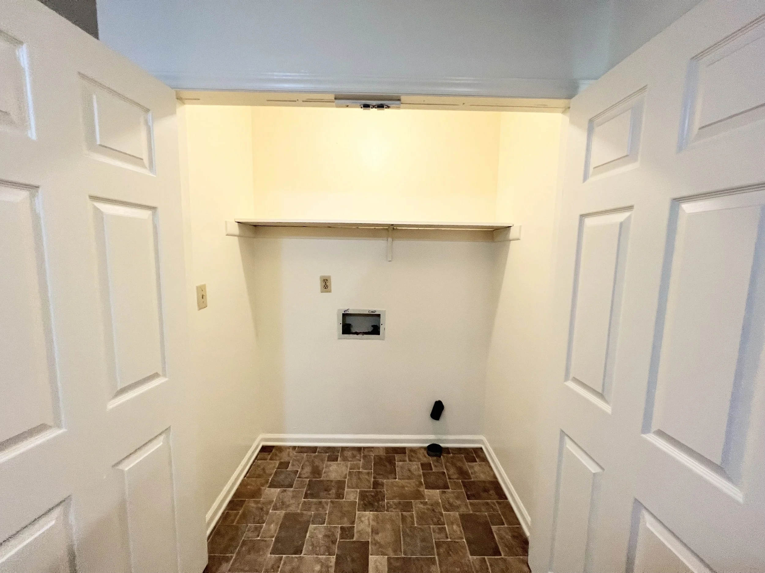 Hill Street Duplex - Laundry Closet in Kitchen