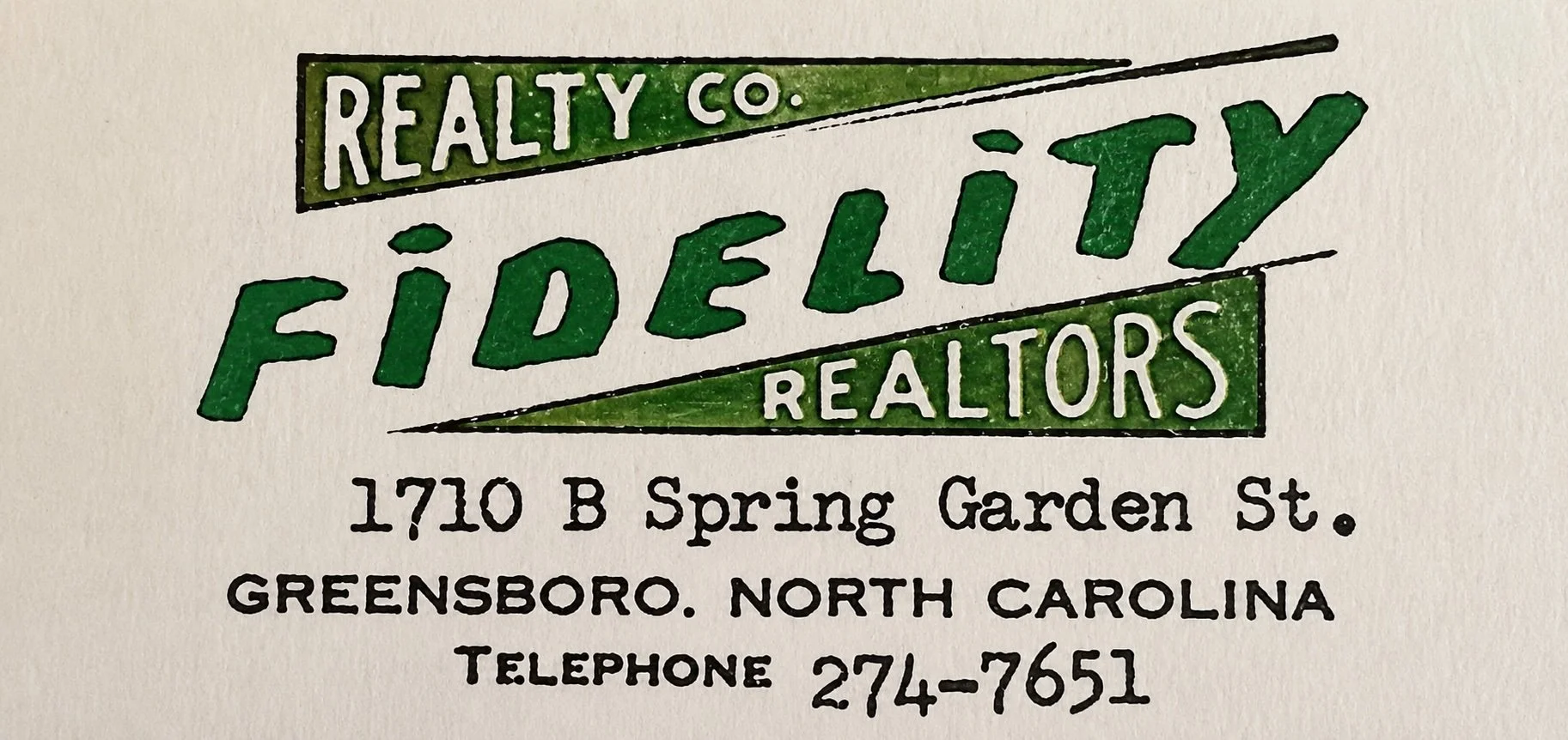 Business card for Realty Co. Fidelity Realtors, located at 1710 B Spring Garden St., Greensboro, North Carolina, with the phone number 274-7651.