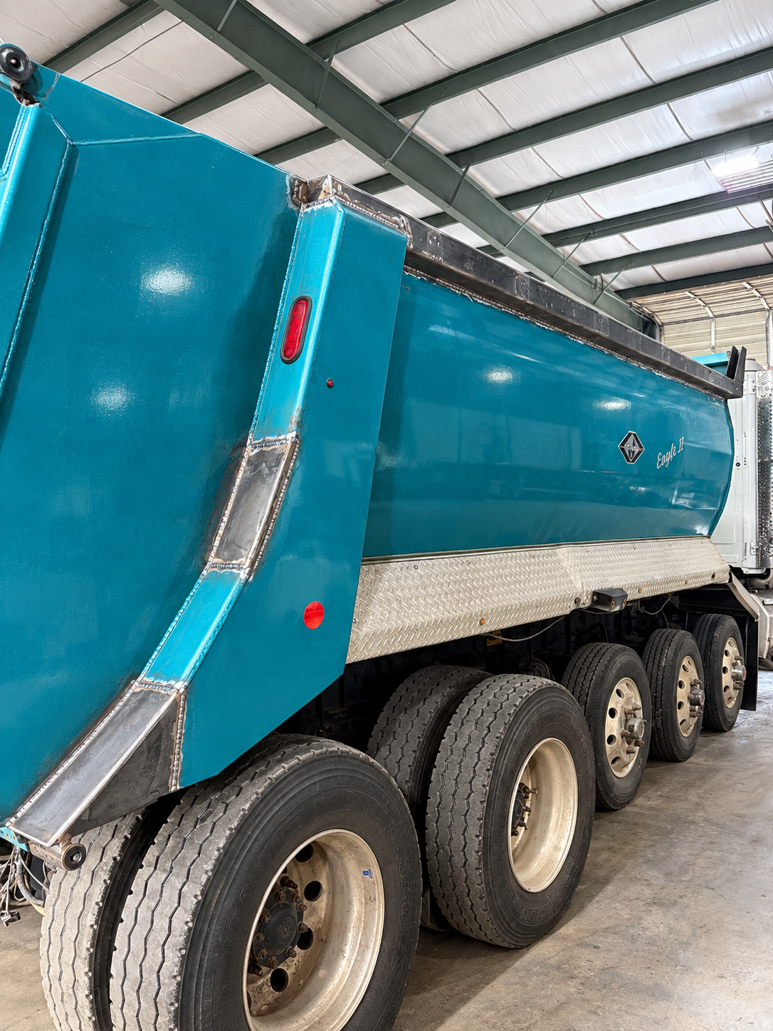 Teal Dump Trailer Weld Repairs.png