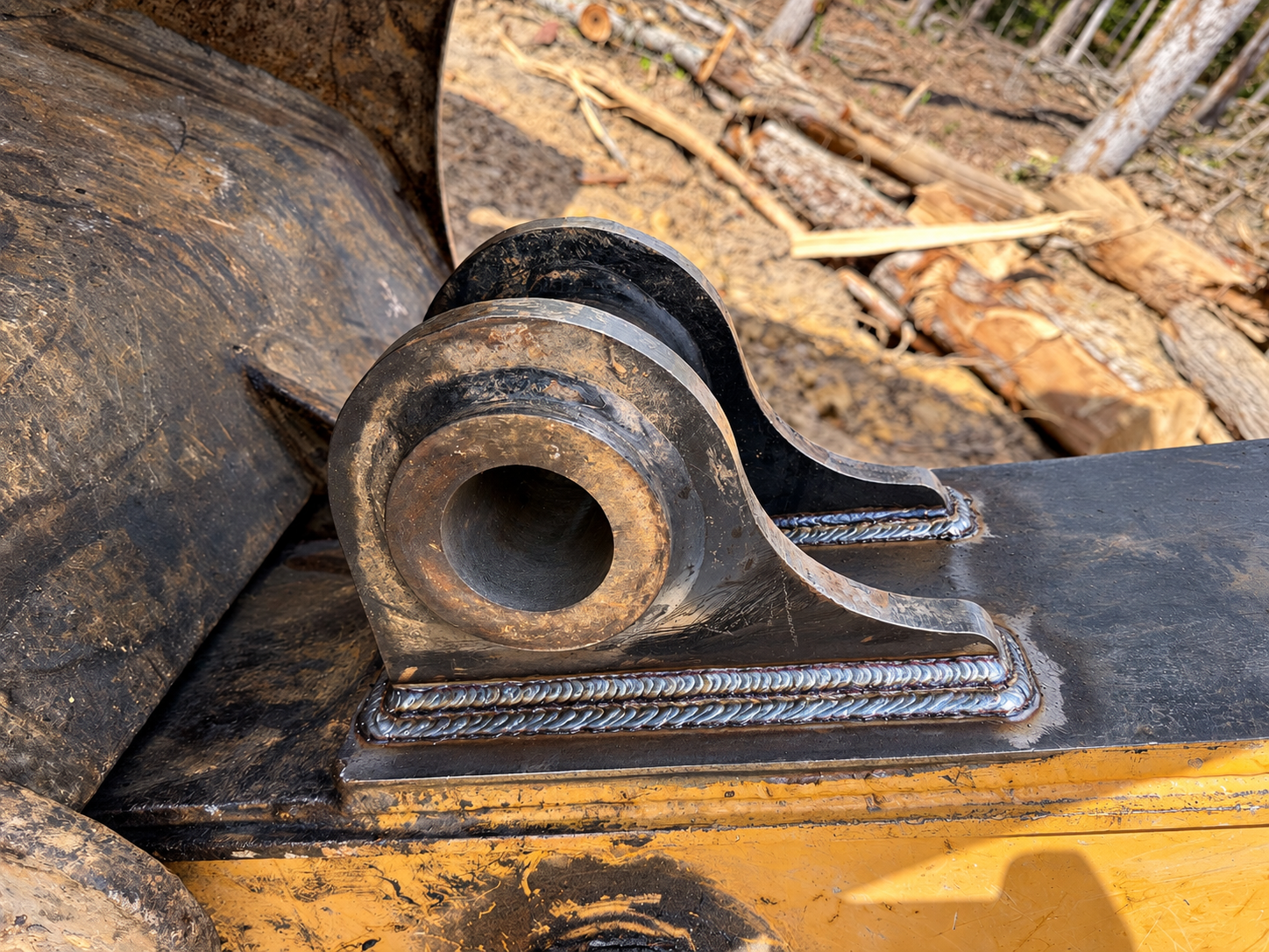 Excavator Hinge Welds in Sunlight.png