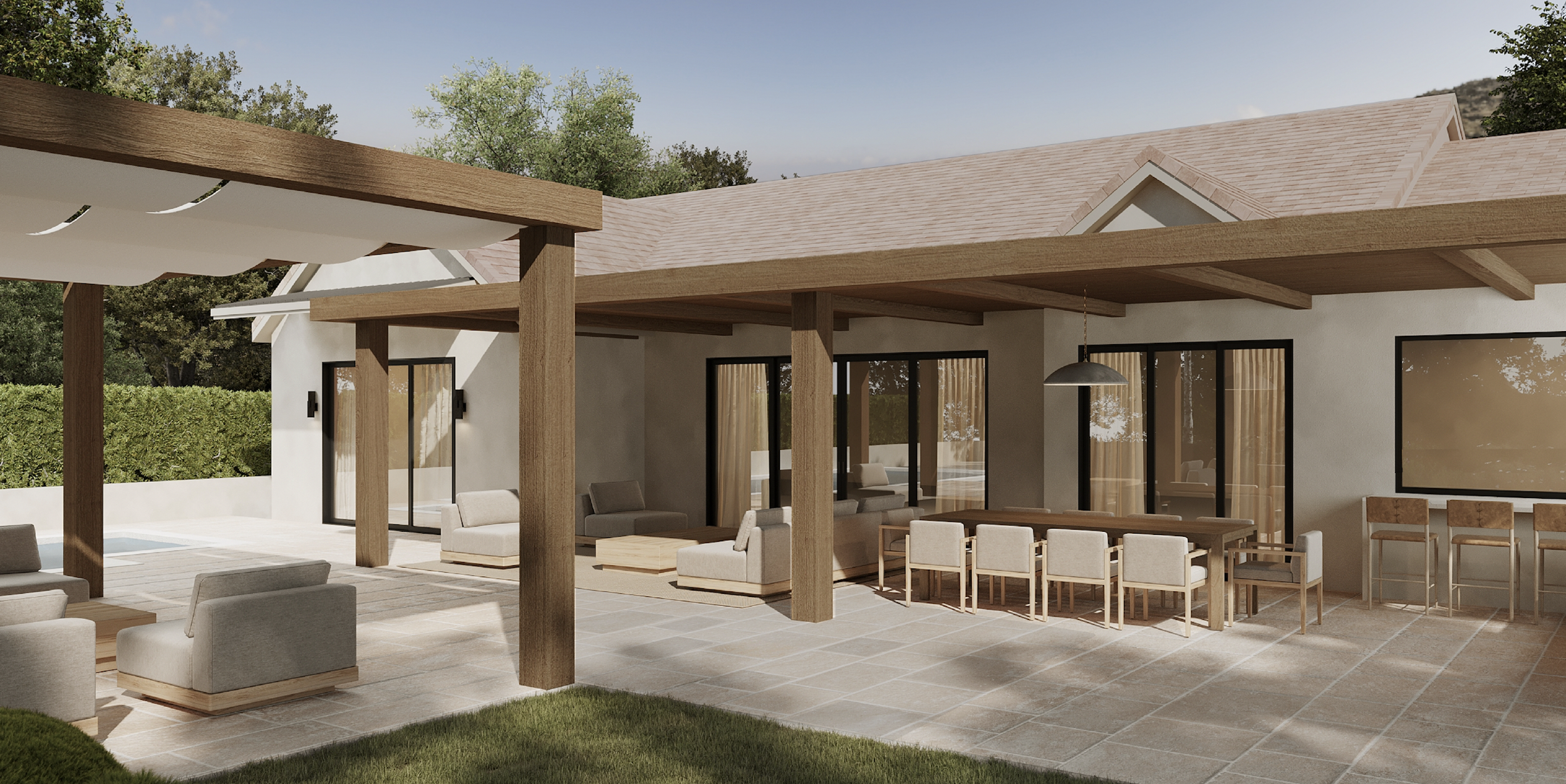 A modern outdoor patio area of a house with a wooden pergola, outdoor seating, and glass sliding doors leading inside, with trees in the background.