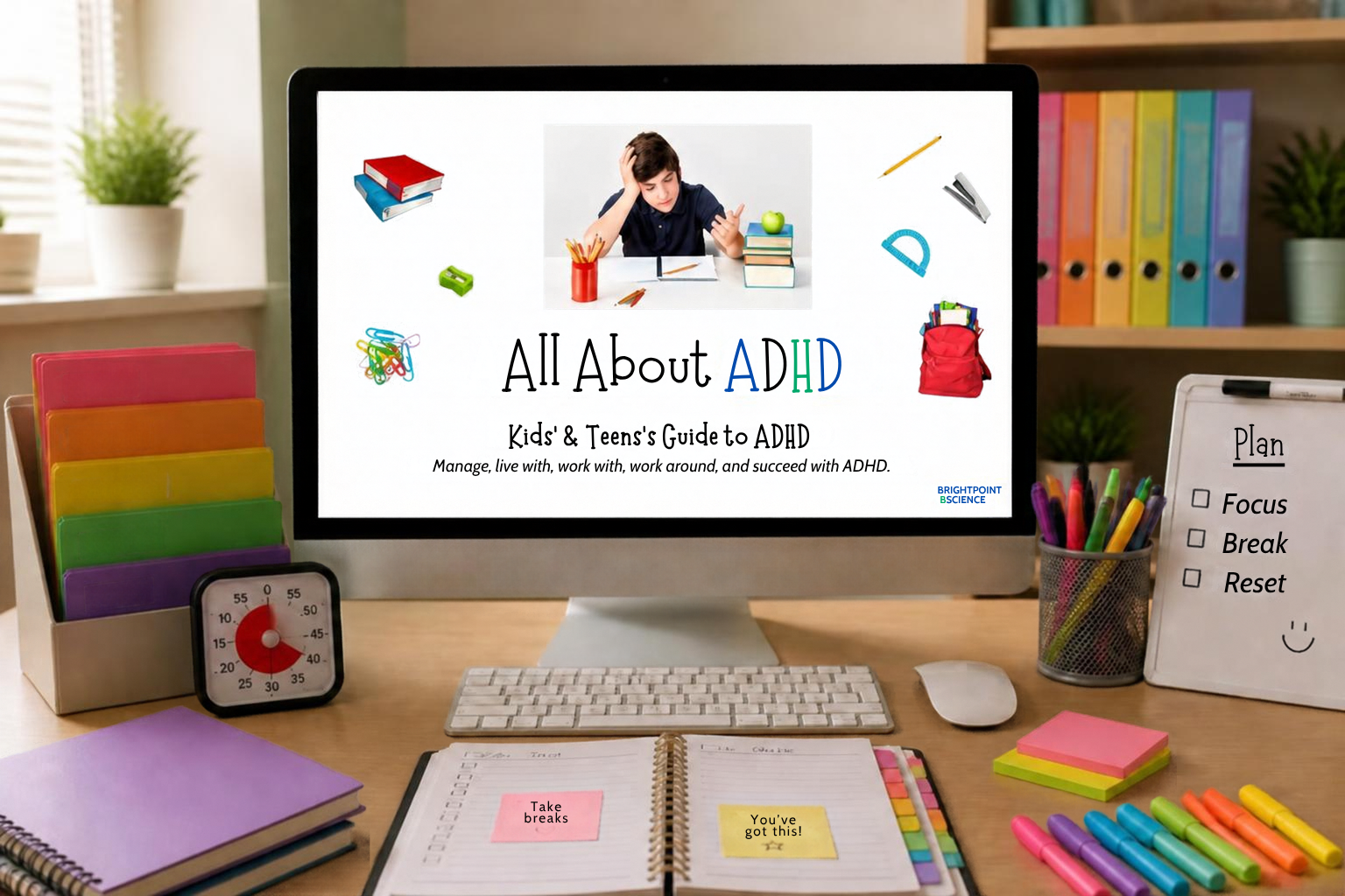 Computer screen displaying a guide titled 'All About ADHD' with a photo of a young boy appearing stressed, surrounded by school supplies. The desk has organized notebooks, markers, sticky notes, a timer, and a whiteboard with checkboxes for planning.