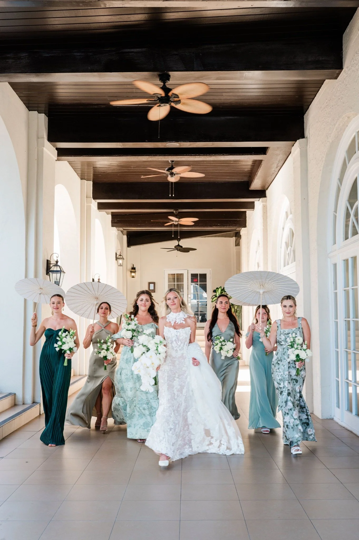 casa-marina-bride-bridesmaids-parasols.jpg