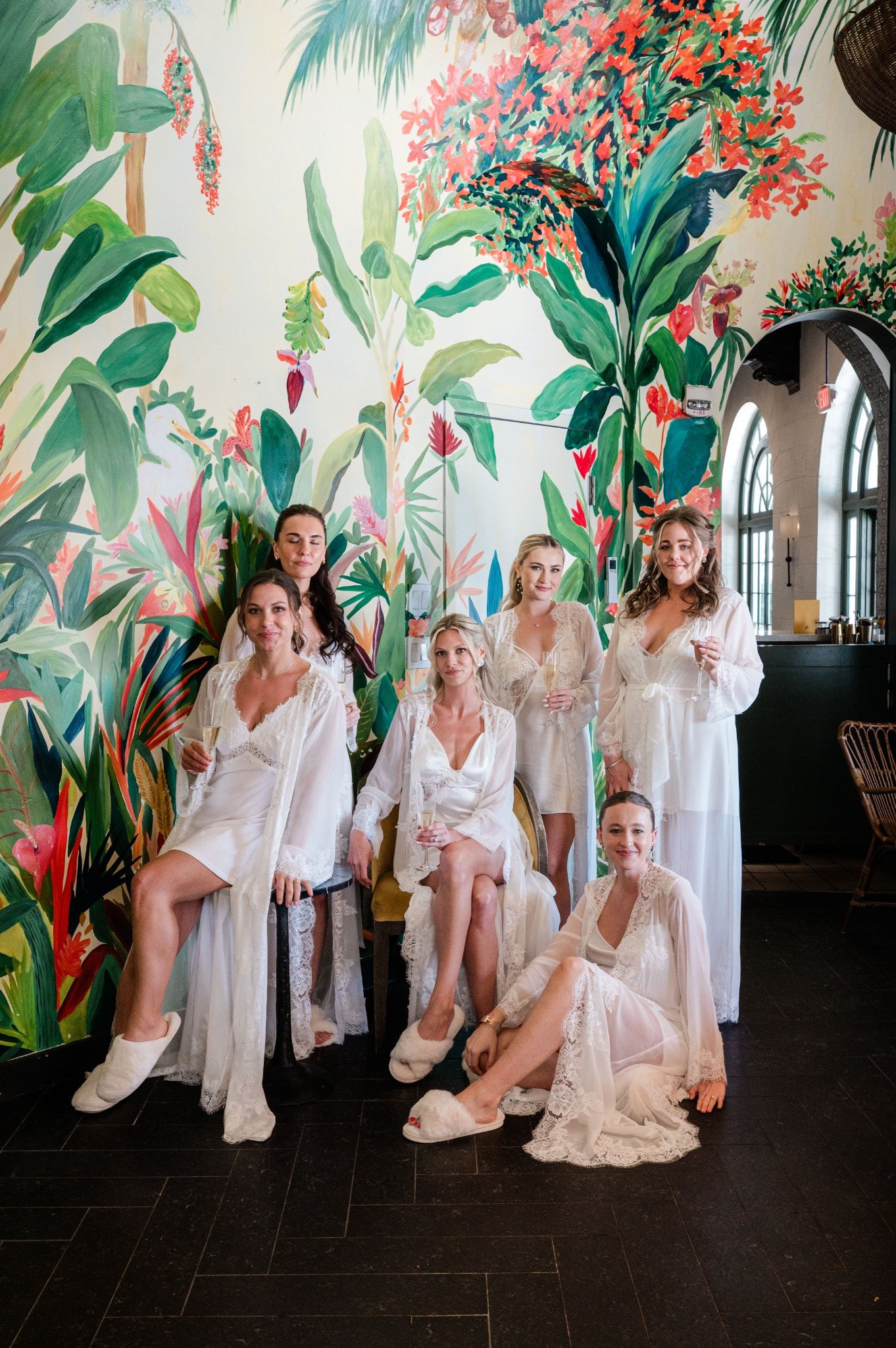 casa-marina-bridesmaids-getting-ready-tropical-mural.jpg
