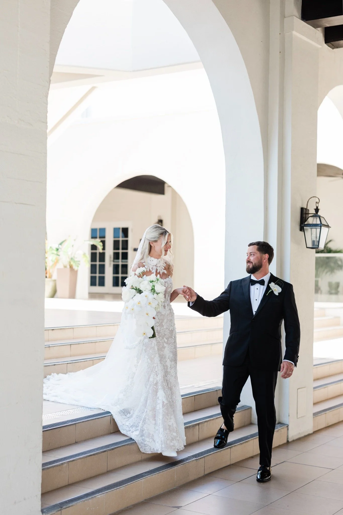 casa-marina-couple-portrait-arched-walkway.jpg