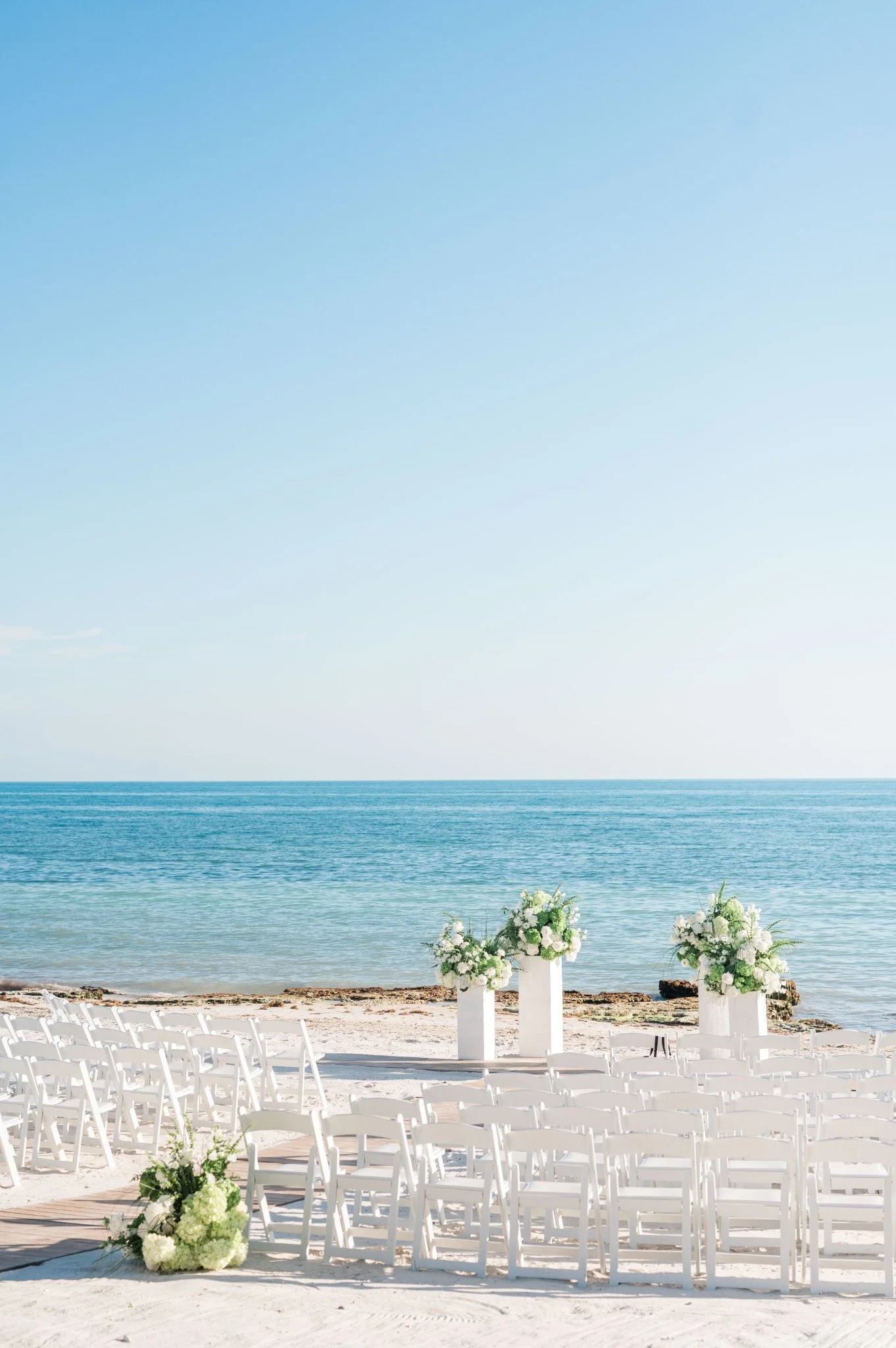 casa-marina-key-west-beach-ceremony-floral-altar.jpg