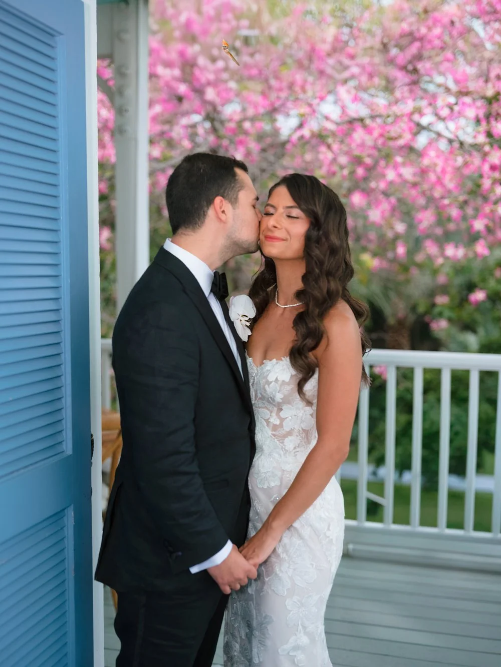 pierres-morada-bay-islamorada-bride-groom-romantic-portrait-pink-flowers.jpg