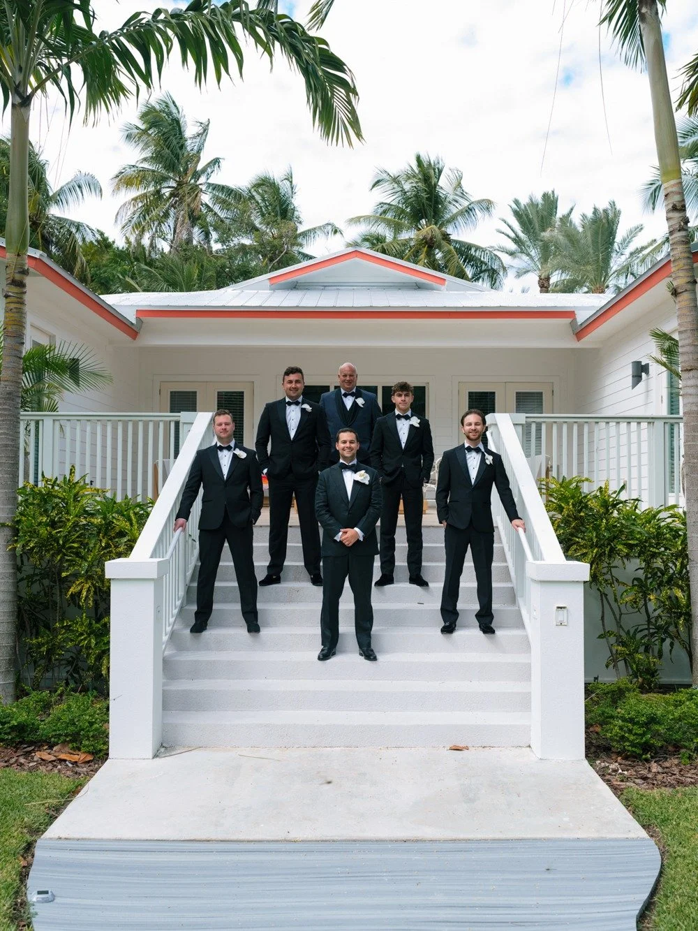 pierres-morada-bay-islamorada-groom-groomsmen-black-tuxedos.jpg