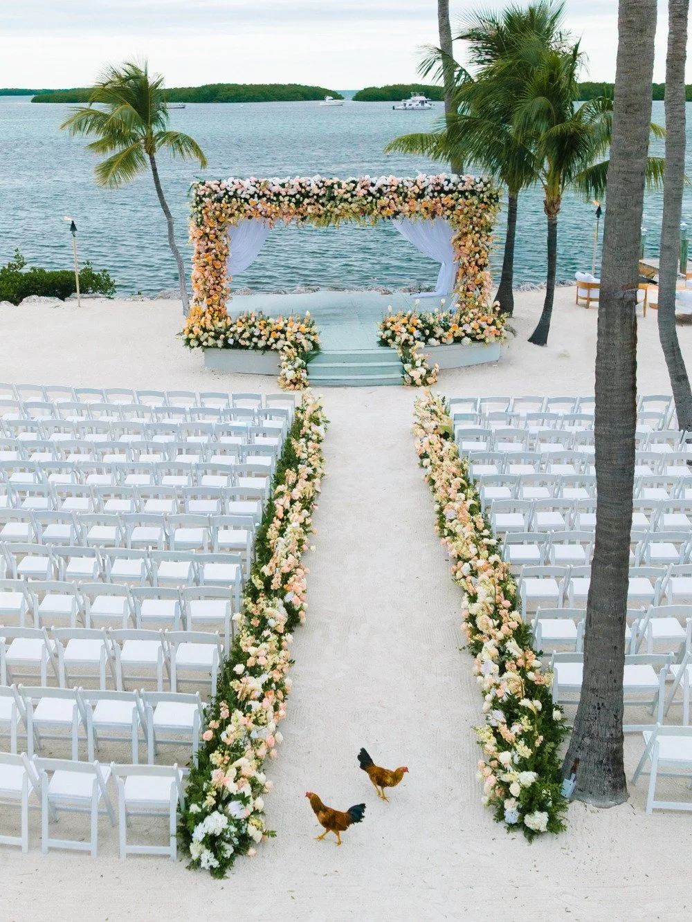 pierres-morada-bay-islamorada-waterfront-floral-wedding-ceremony-arch.jpg