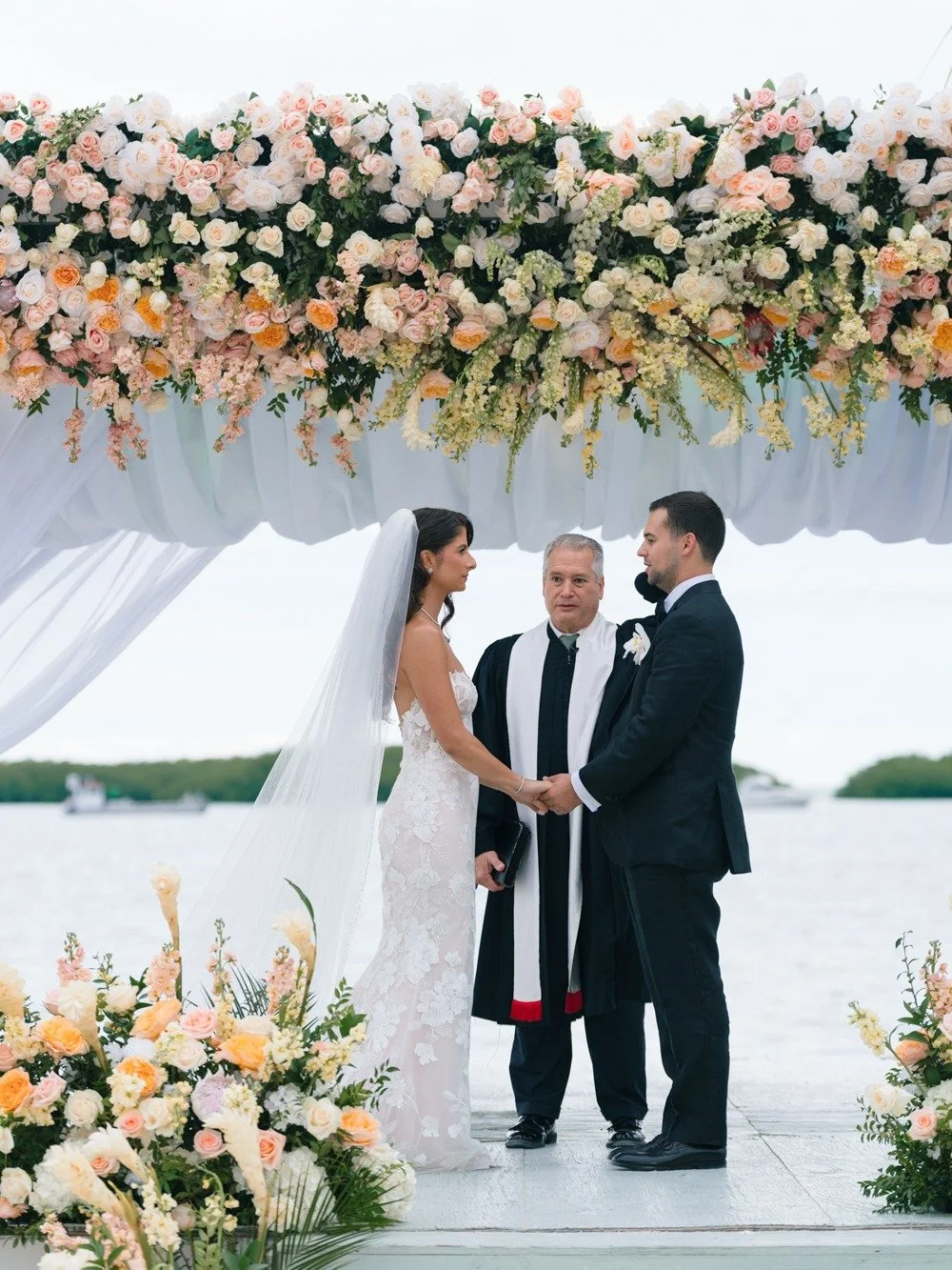 pierres-morada-bay-islamorada-waterfront-wedding-ceremony-vows-floral-chuppah.jpg