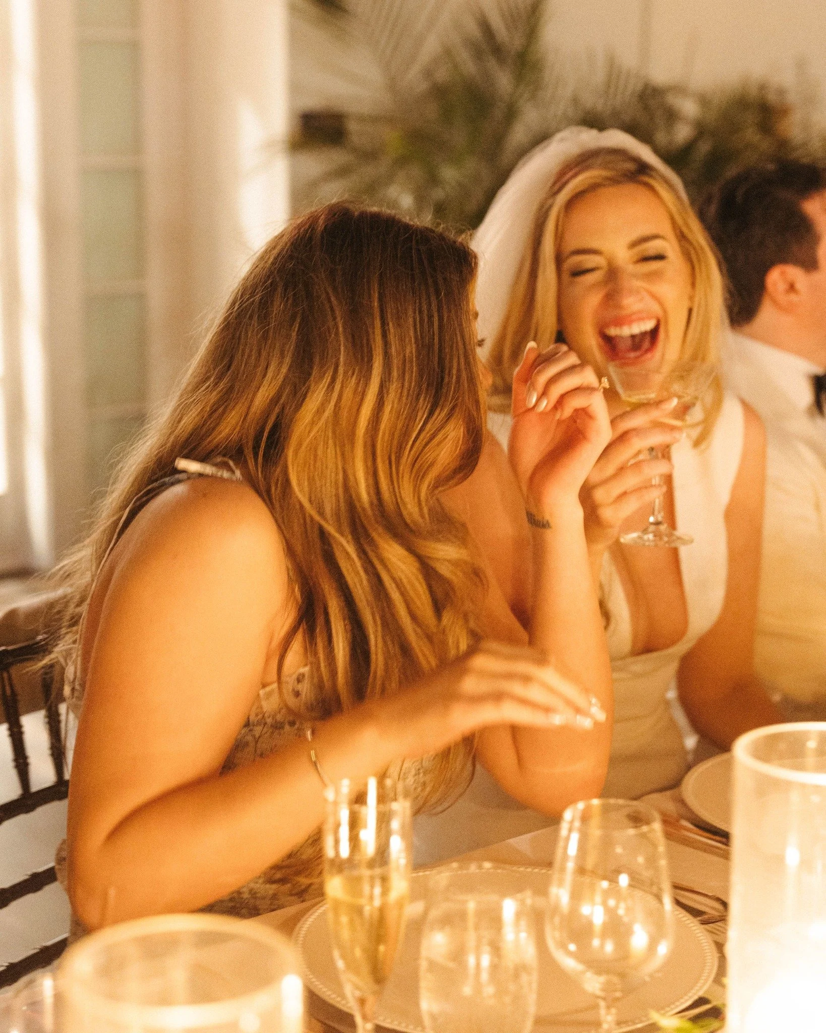 casa-marina-key-west-wedding-bride-laughing-at-reception.jpg
