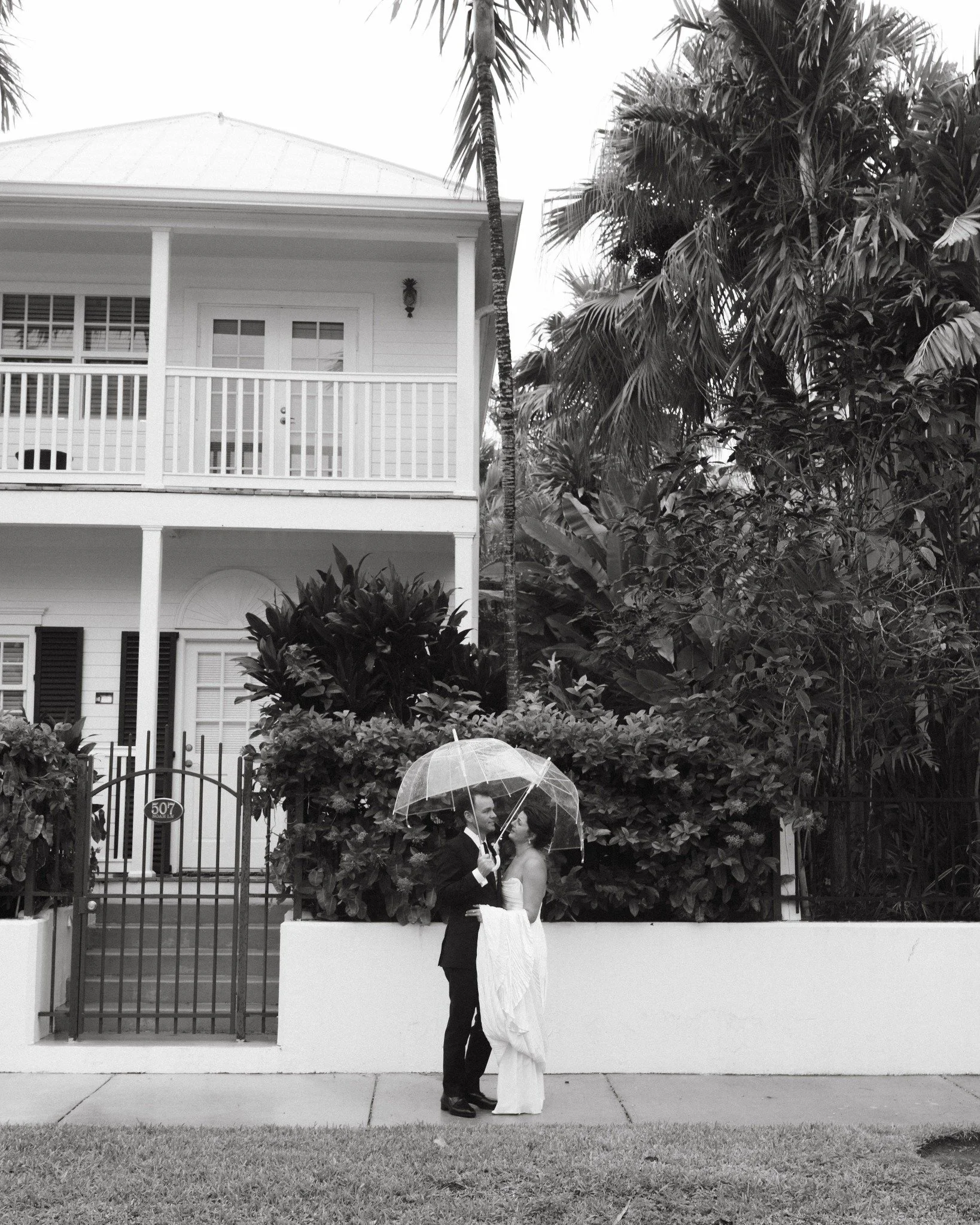 key-west-wedding-couple-black-white-umbrella-street-portrait.jpg