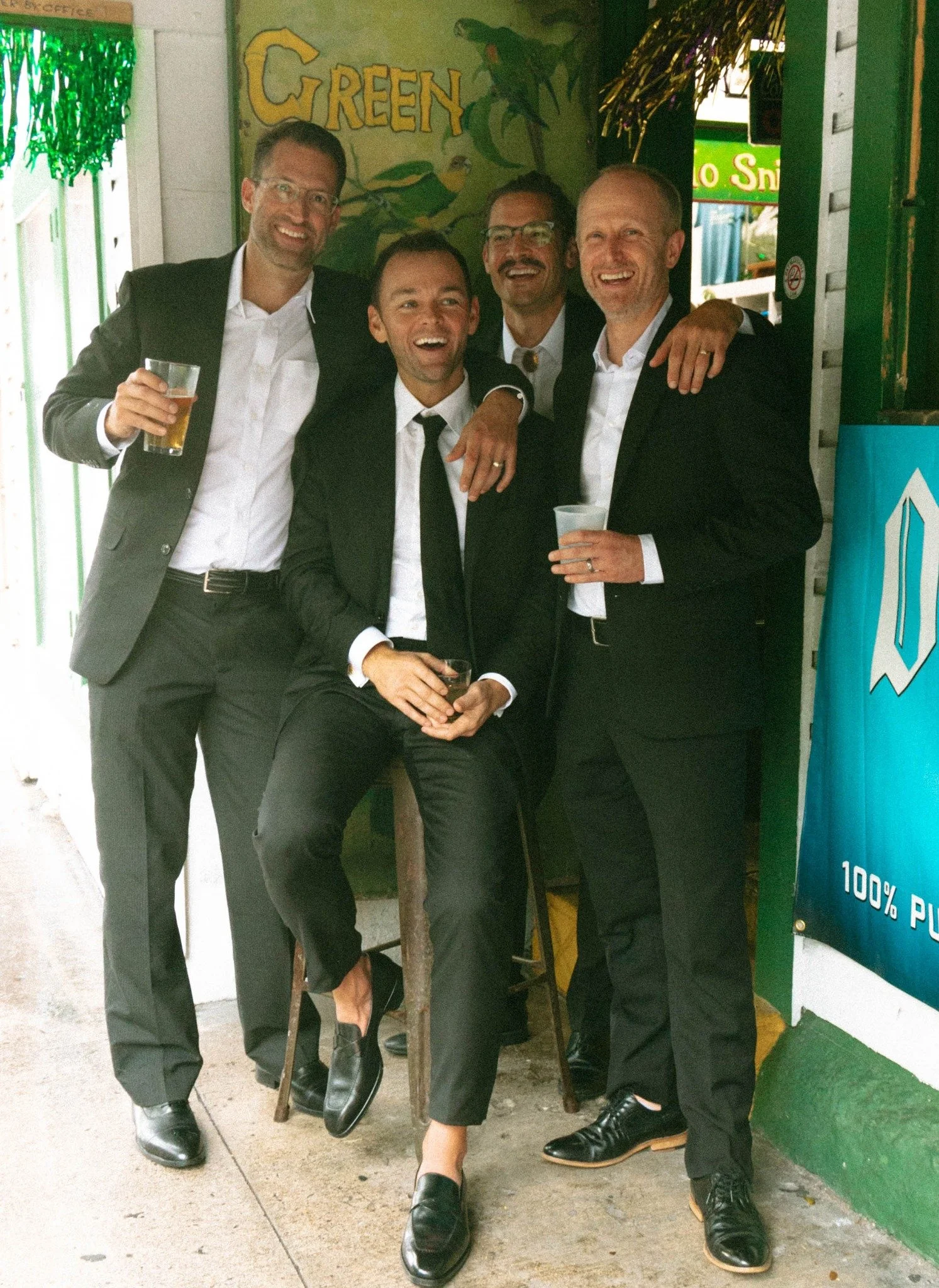 key-west-wedding-groom-groomsmen-casual-bar-portrait-02.jpg