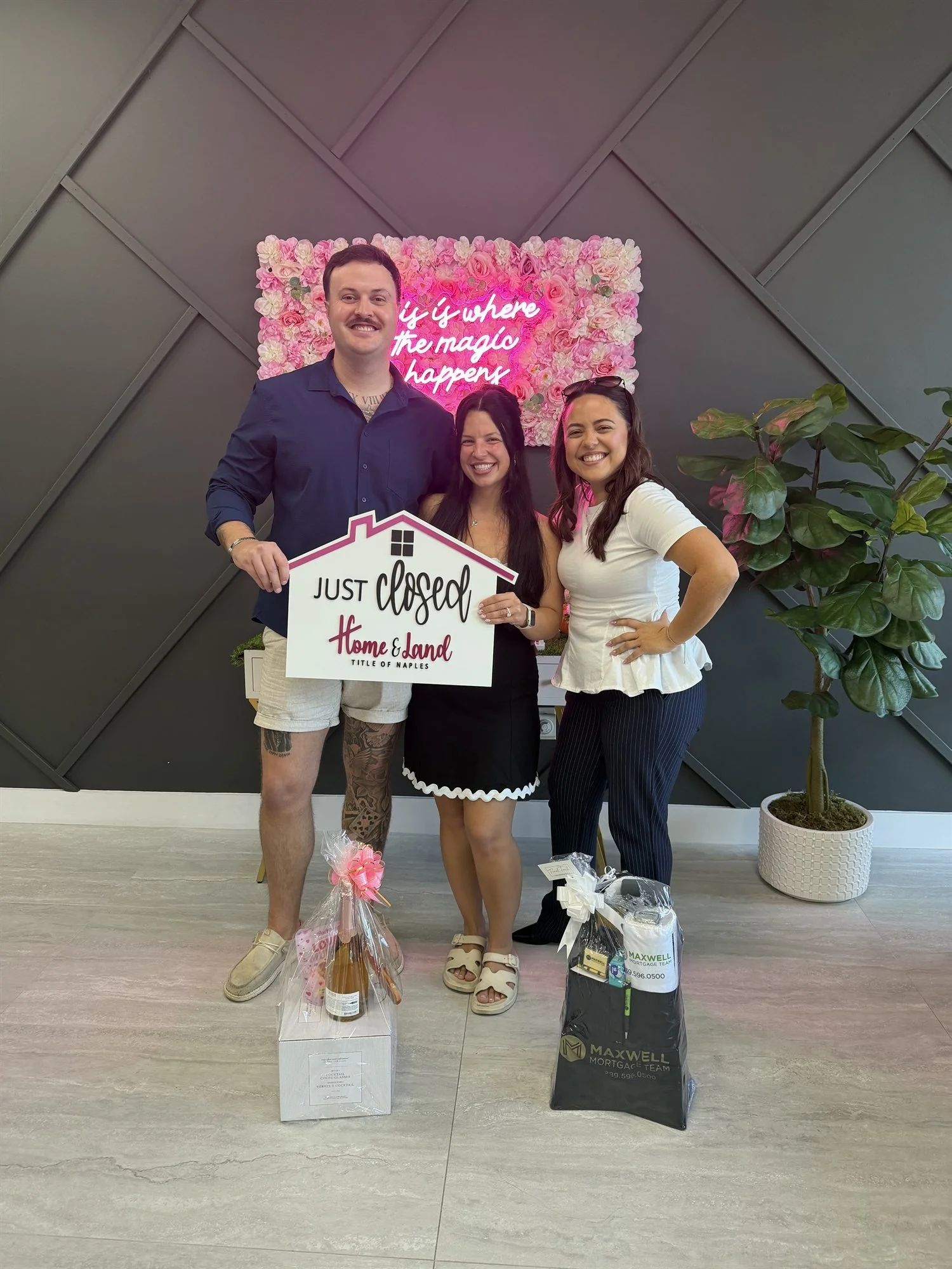 Andrea Cerrada with buyers holding a Just Closed Home Sweet Home sign in Naples