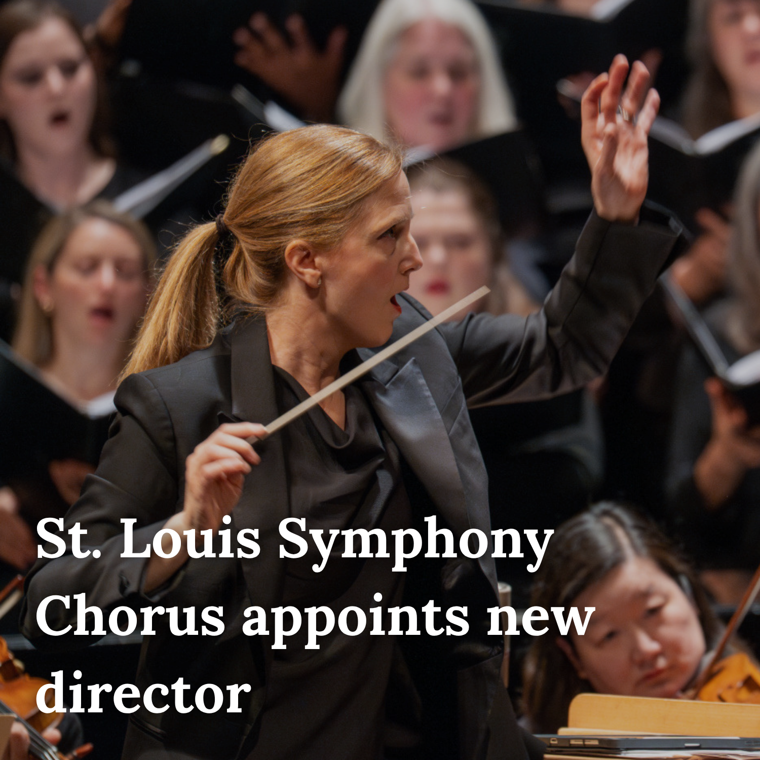 A woman conducting an orchestra at a concert with choir members singing behind her, captioned 'St. Louis Symphony Chorus appoints new director'.