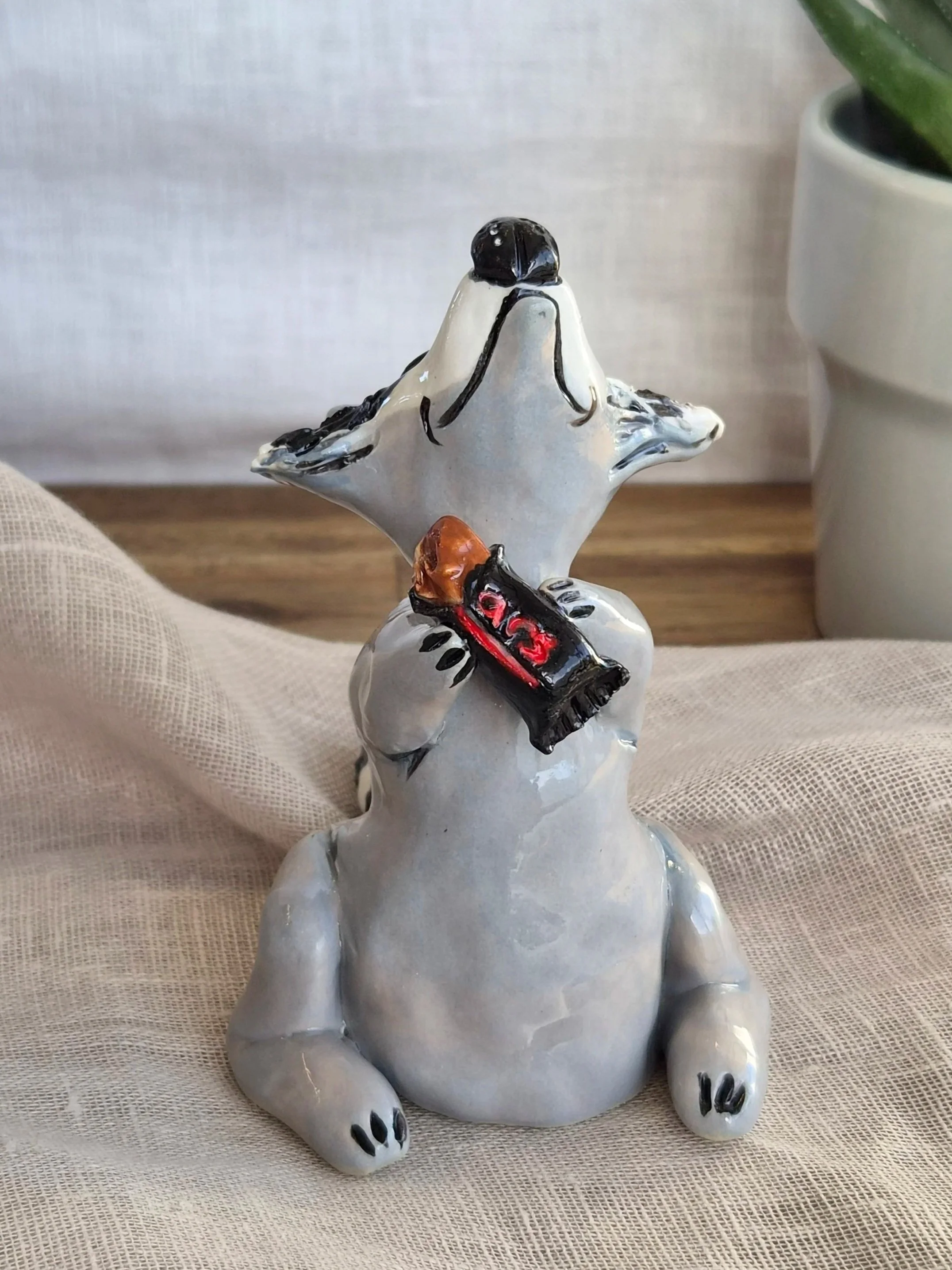 Raccoon with MARS Bar treat