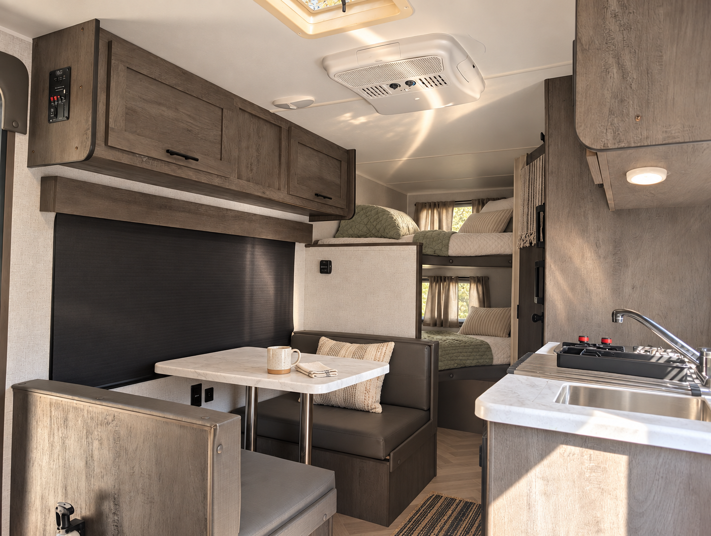 Kitchen with stove, microwave and two refrigerators. (One in the outside hatch.)