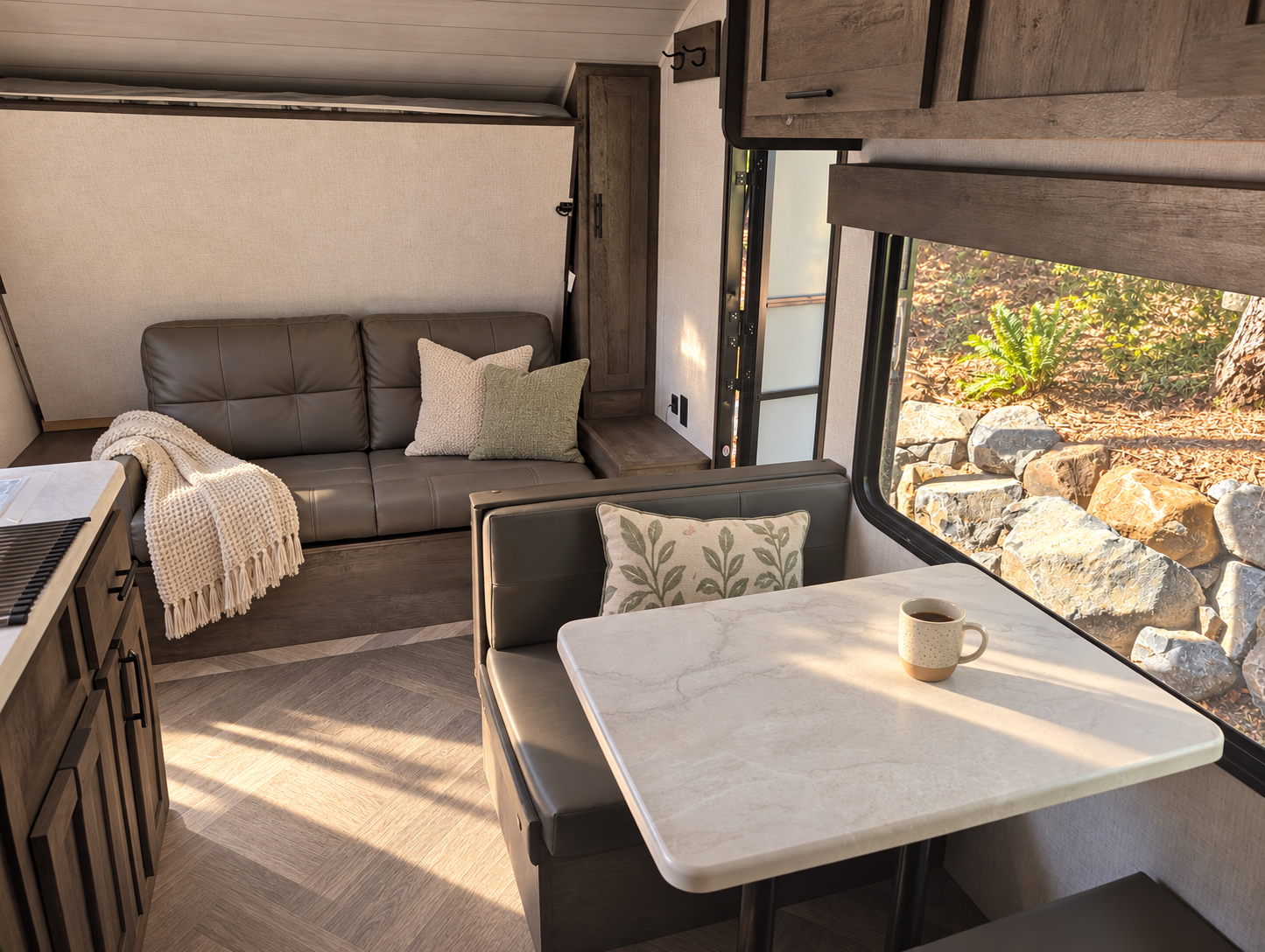 Dining table that converts into a fourth bed.
