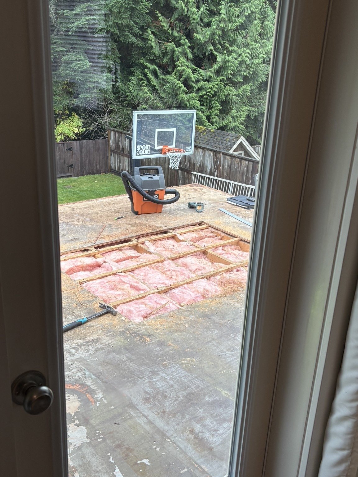 Repair stage: deck layers exposed before rebuilding the surface.