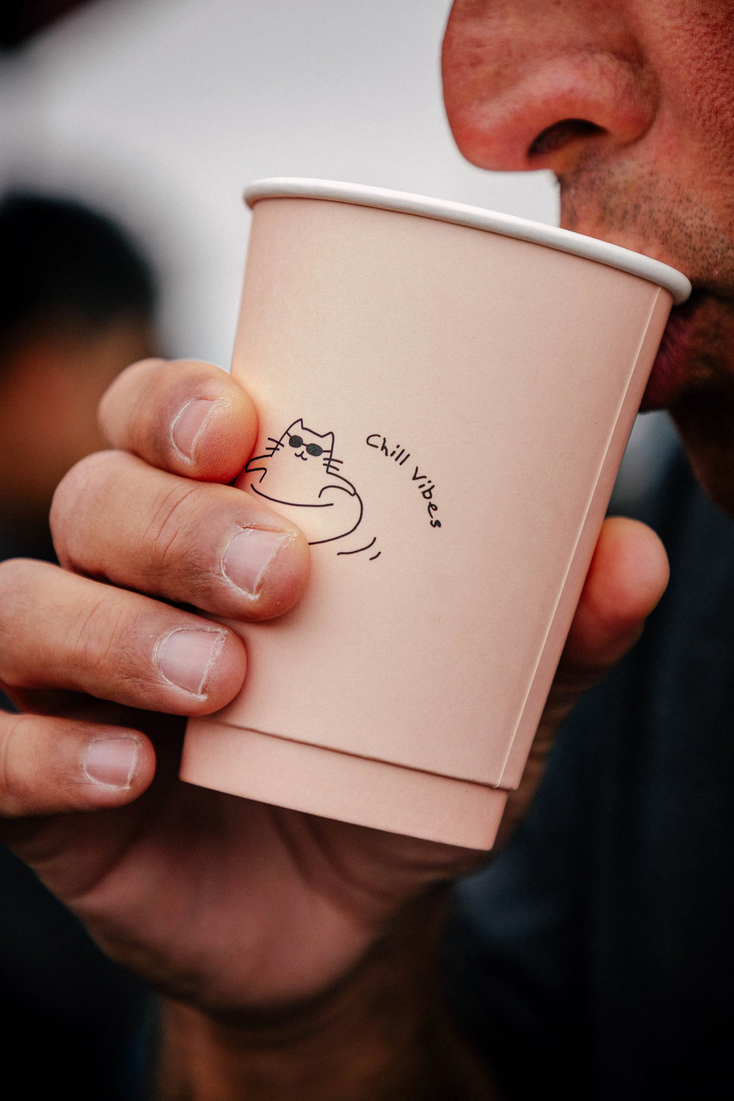 Customer drinking hot latte