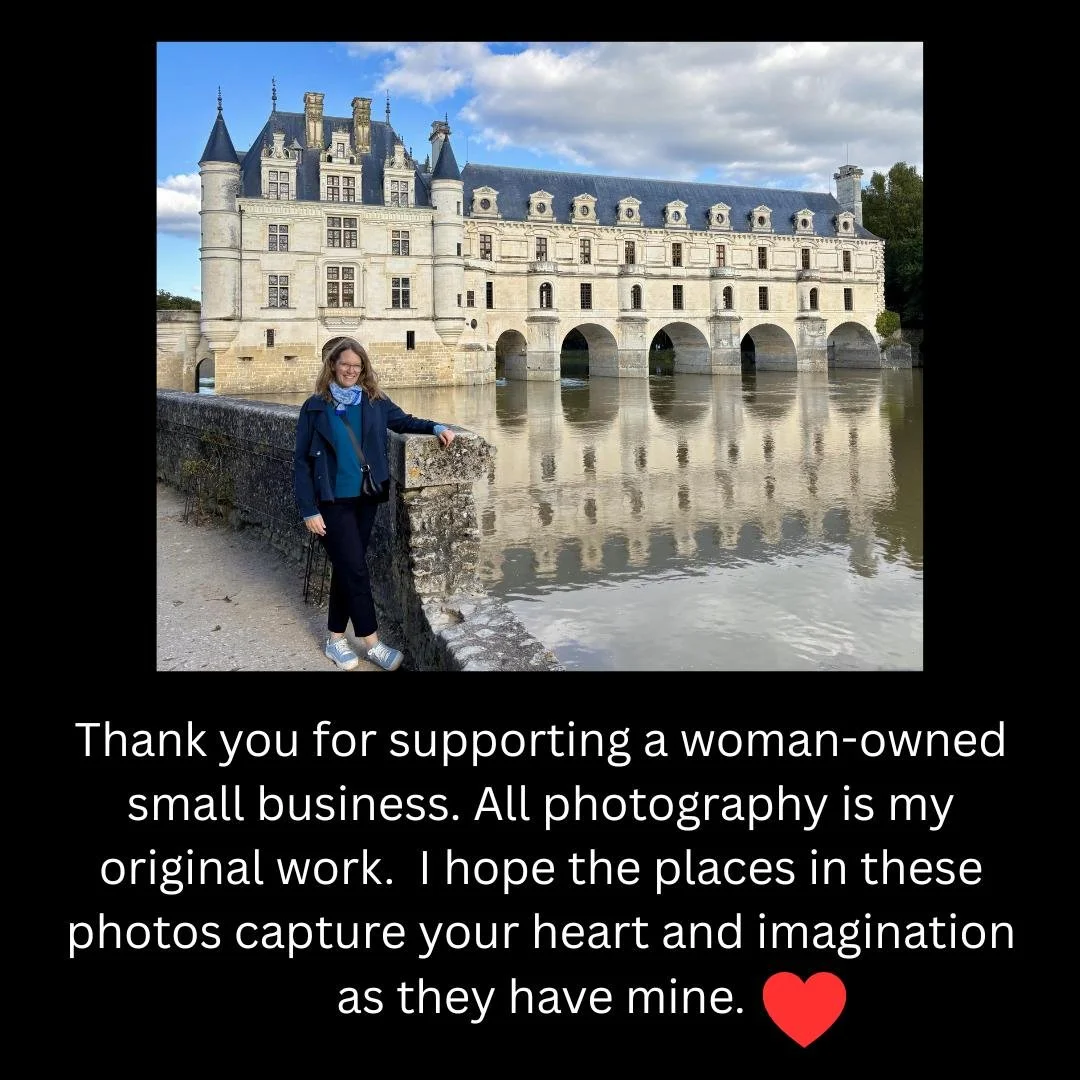 Photo of the photographer at Chateau Chenonceau in France. Text thanks viewer for supporting a woman-owned business.