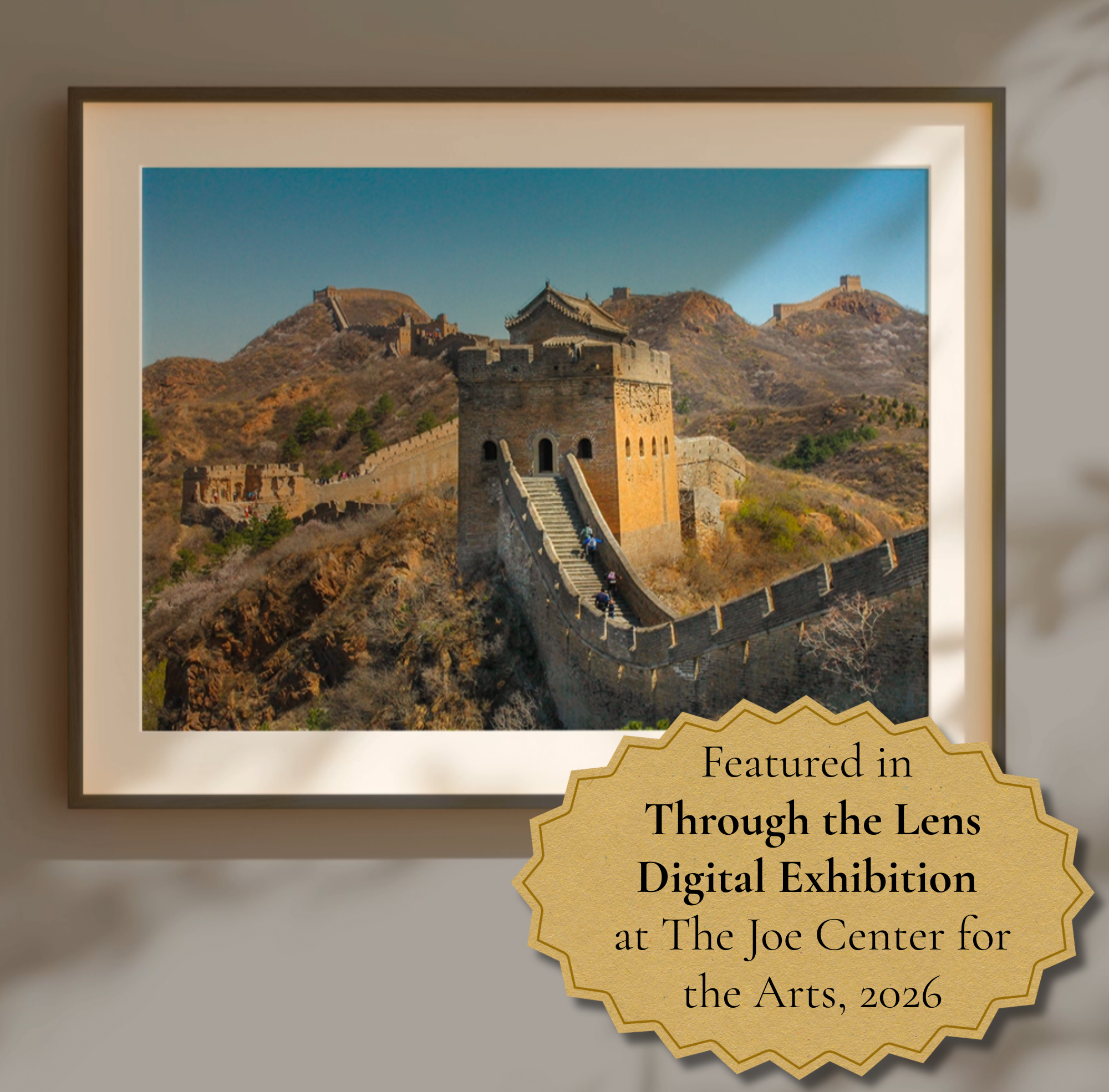 Matted and framed image of the Great Wall of China. Badge on photo says photo was featured in a gallery show at The Joe Gallery in 2026.