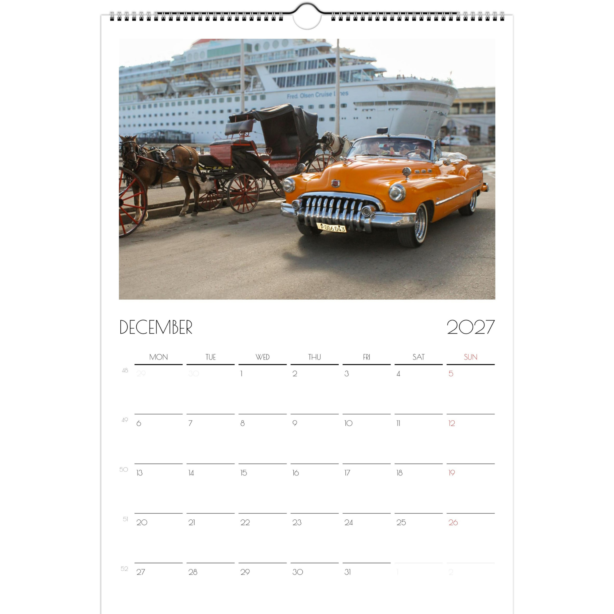 December page of the Classic Cars of Cuba 2027 calendar. The page features a bright orange car from the 1950s driving along the Havana, Cuba harbor. A cruise ship is in the background.