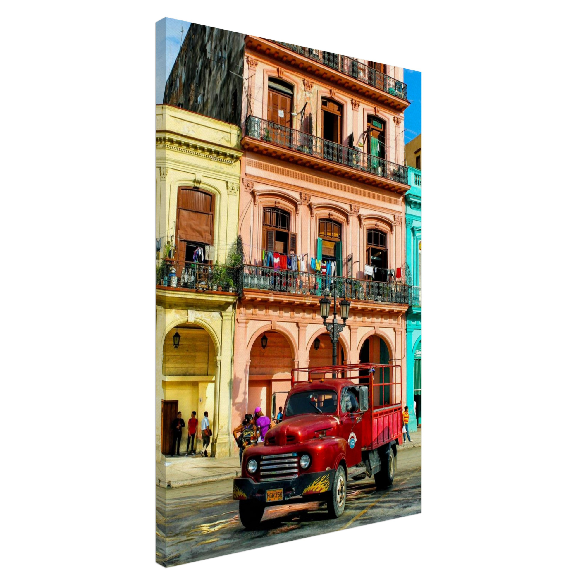 Canvas print showing 1950s red Ford truck parked in front of sherbet-colored buildings in Havana, Cuba.