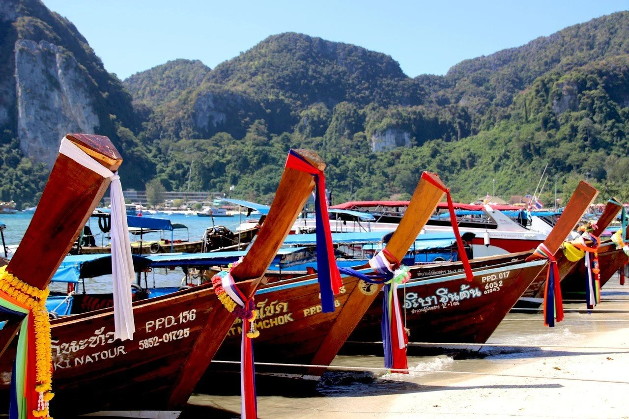 phi-phi-don-longtail-boats-with-ribbons-on-beach.jpg