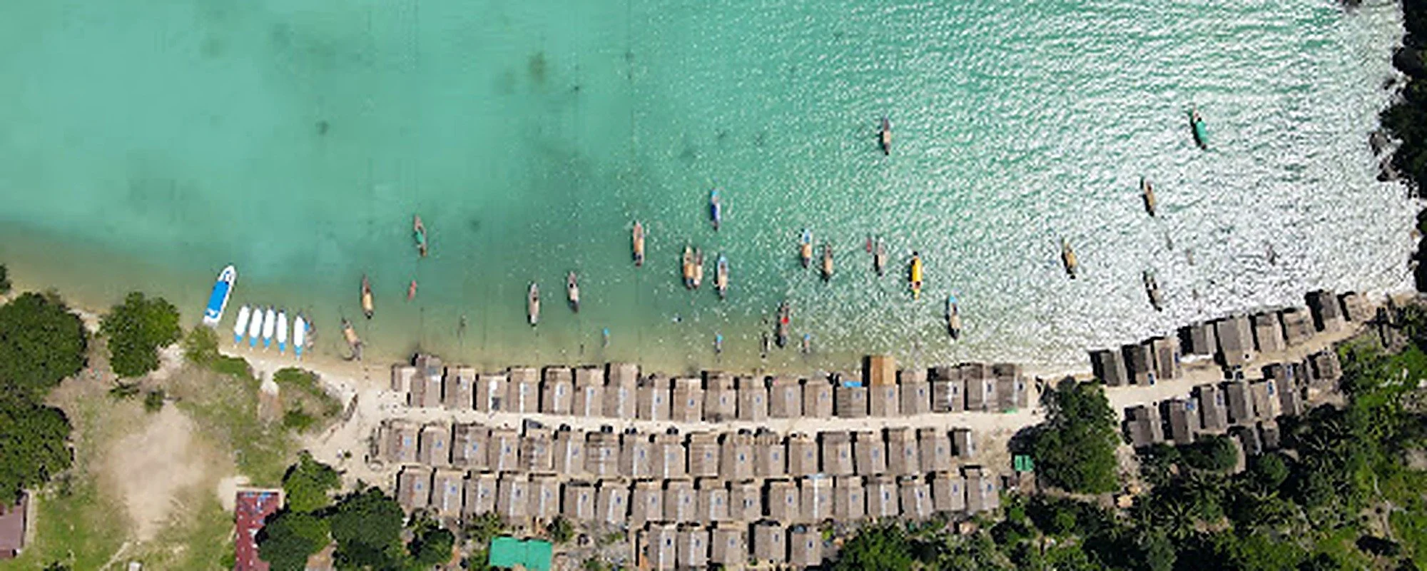 surin-islands-aerial-turquoise-bay-moken-village-banner-2000x800.jpg