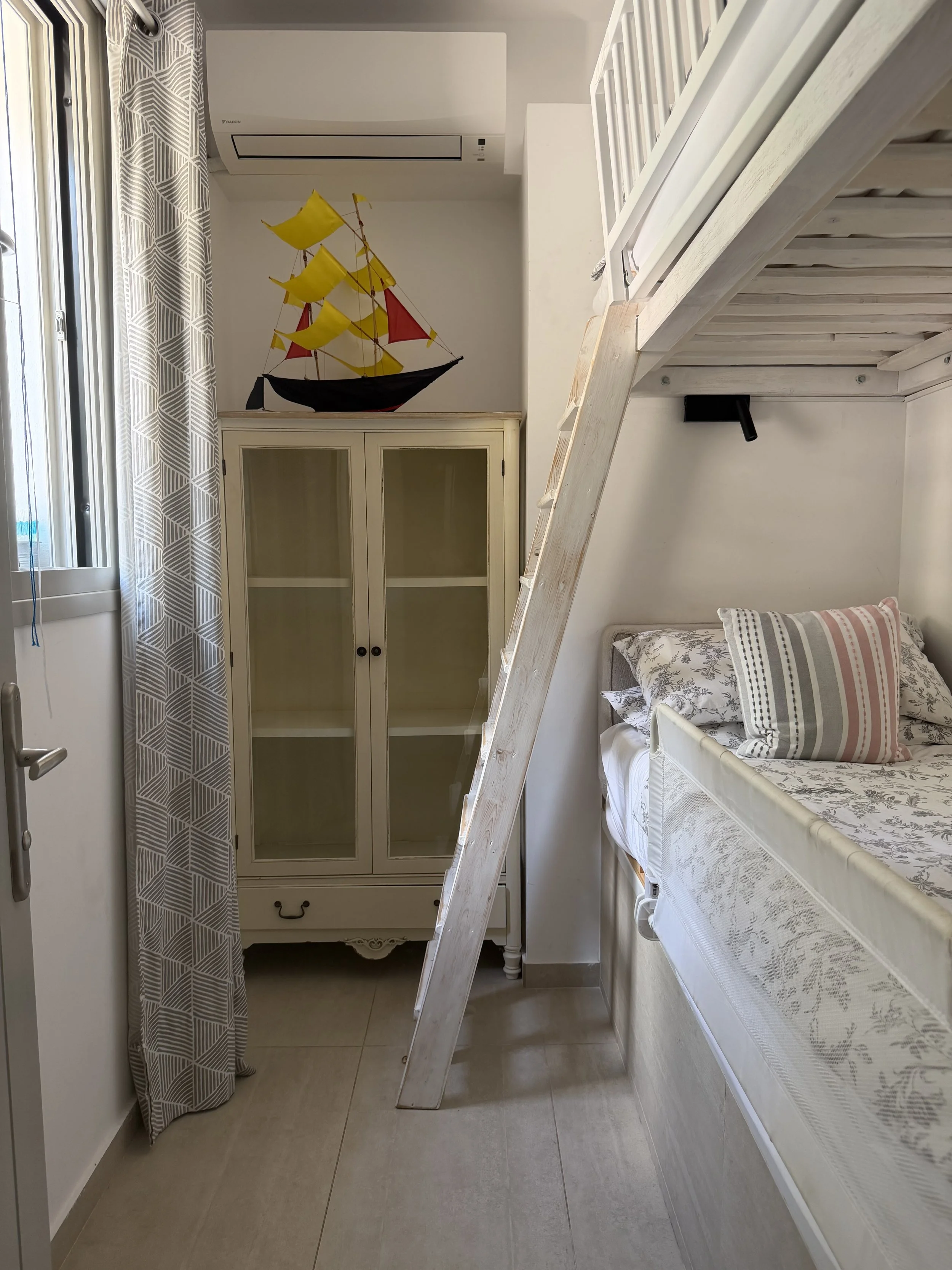 bedroom 6 Single bunk room - very small - with 2 x 90cm (3') beds, ensuite shower room, AC, safe