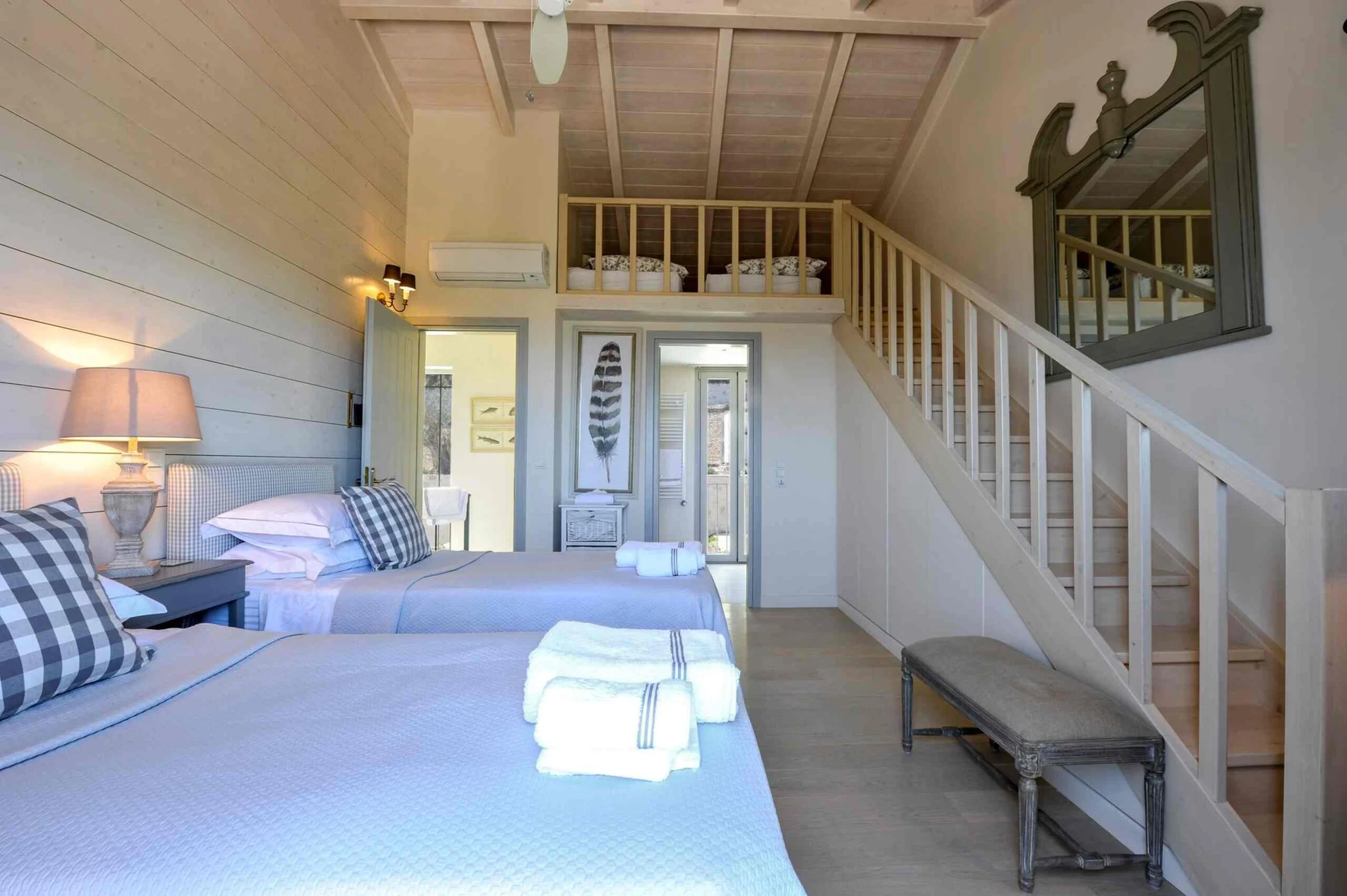 End Bedroom with mezzanine.  (with mattresses for children) superking size bed (zip and link) ensuite shower room, AC, fan and safe