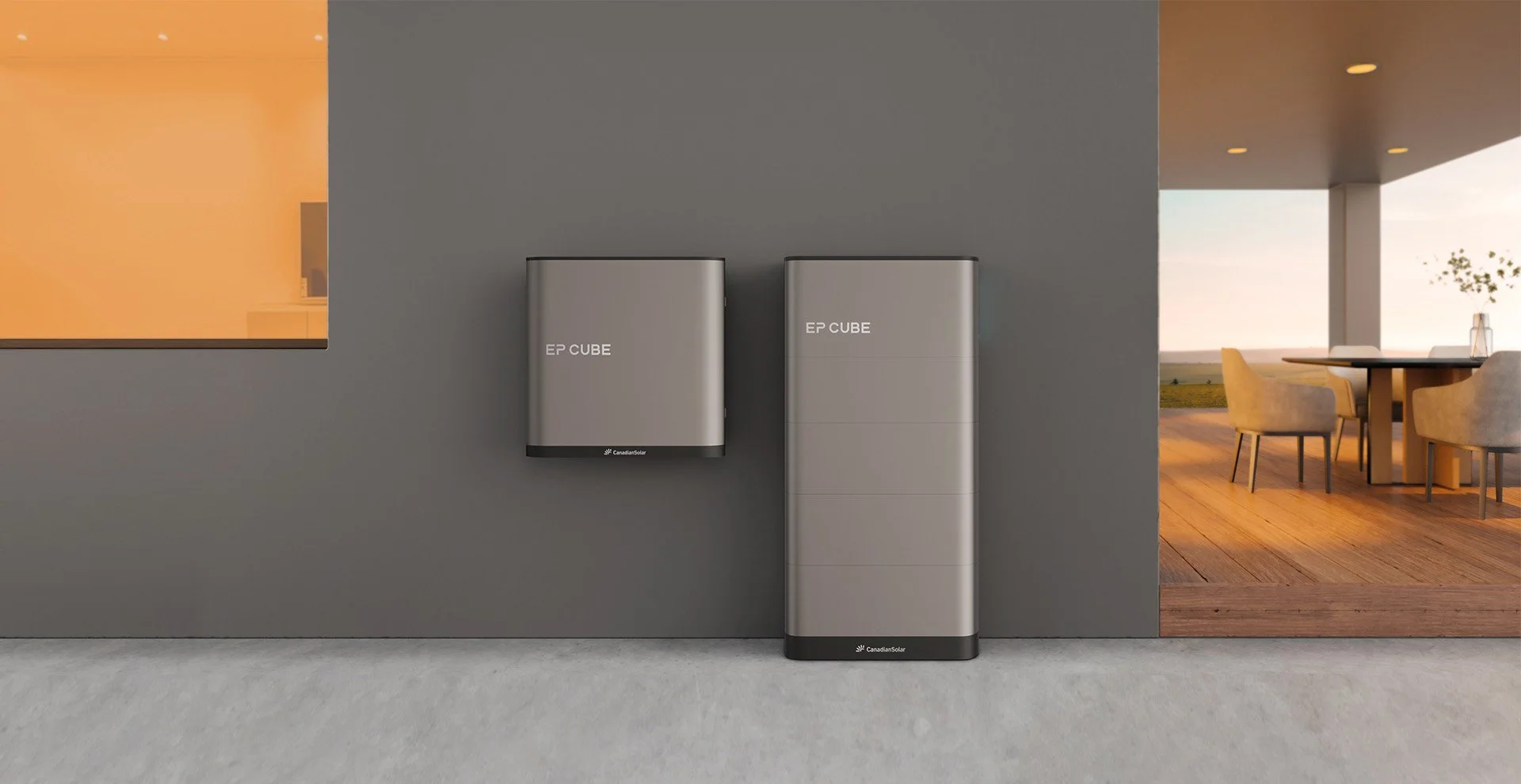 Twee grijze zonnepanelen gemonteerd op een muur binnen een modern huis, met een woon- en eetkamer zichtbaar op de achtergrond.