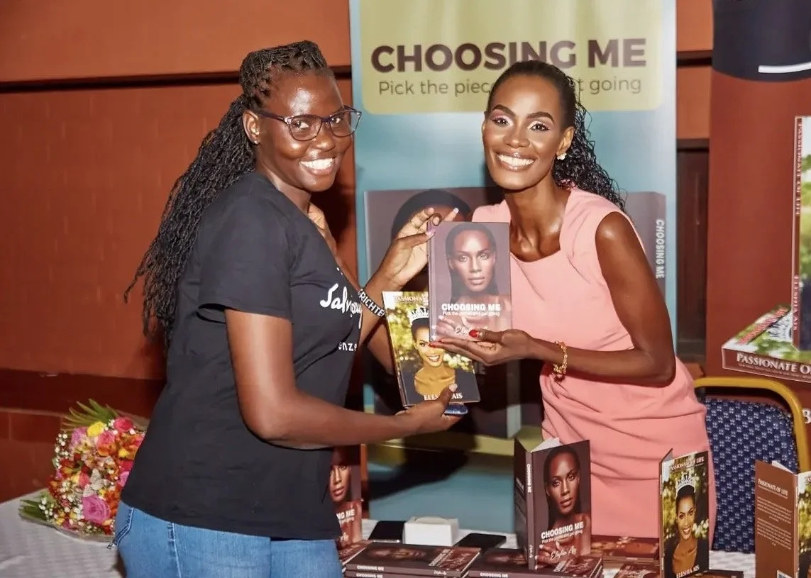 Eleshia Ais smiling at her book signing event.