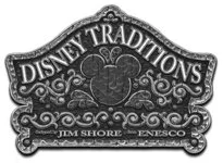 A metal plaque with Disney Traditions branding, featuring Mickey Mouse's head silhouette, and the names Tom Shore and Enesco at the bottom.