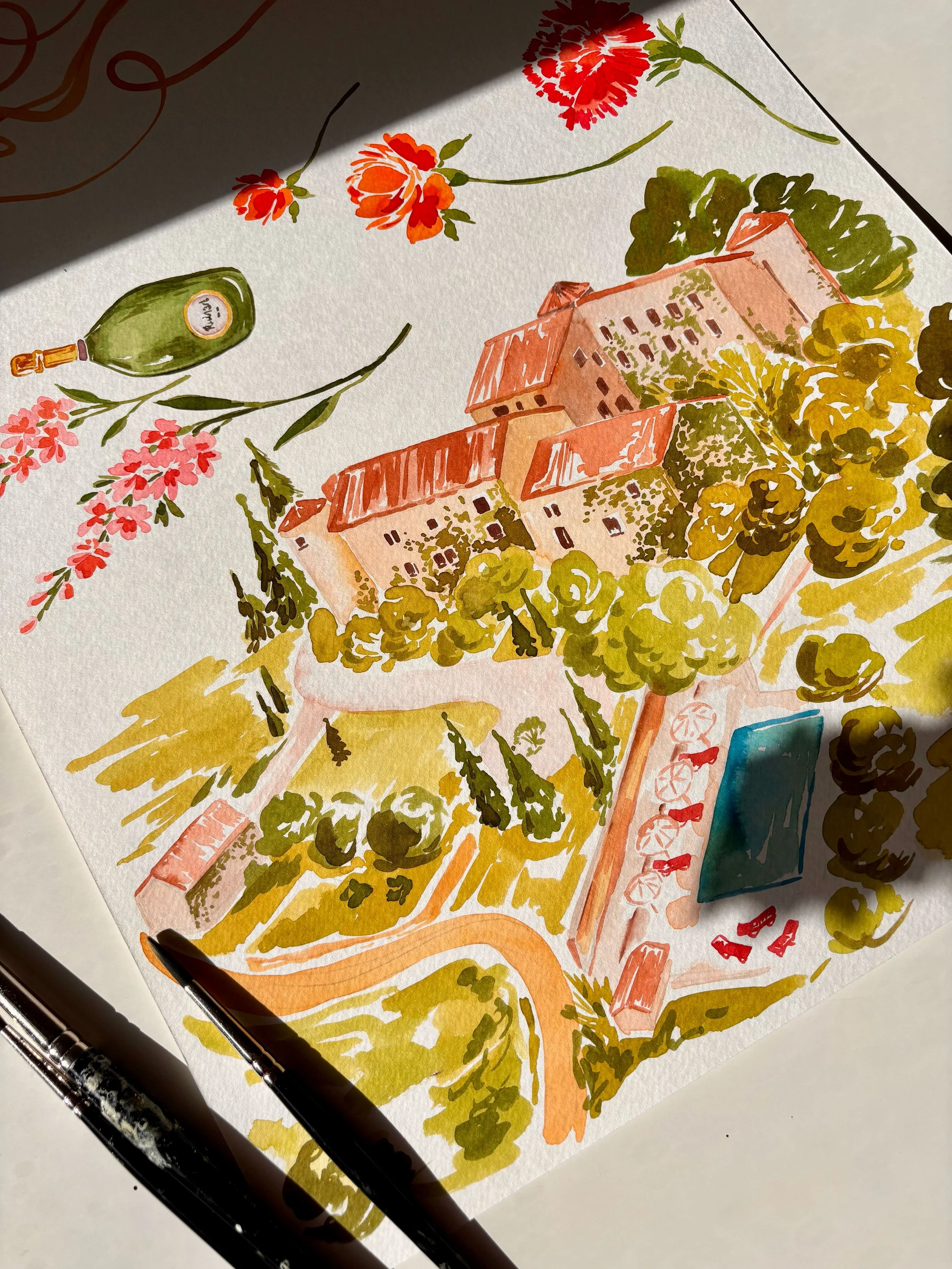 Watercolor painting of a French chateaux surrounded by trees and gardens, with a path and a fountain nearby.