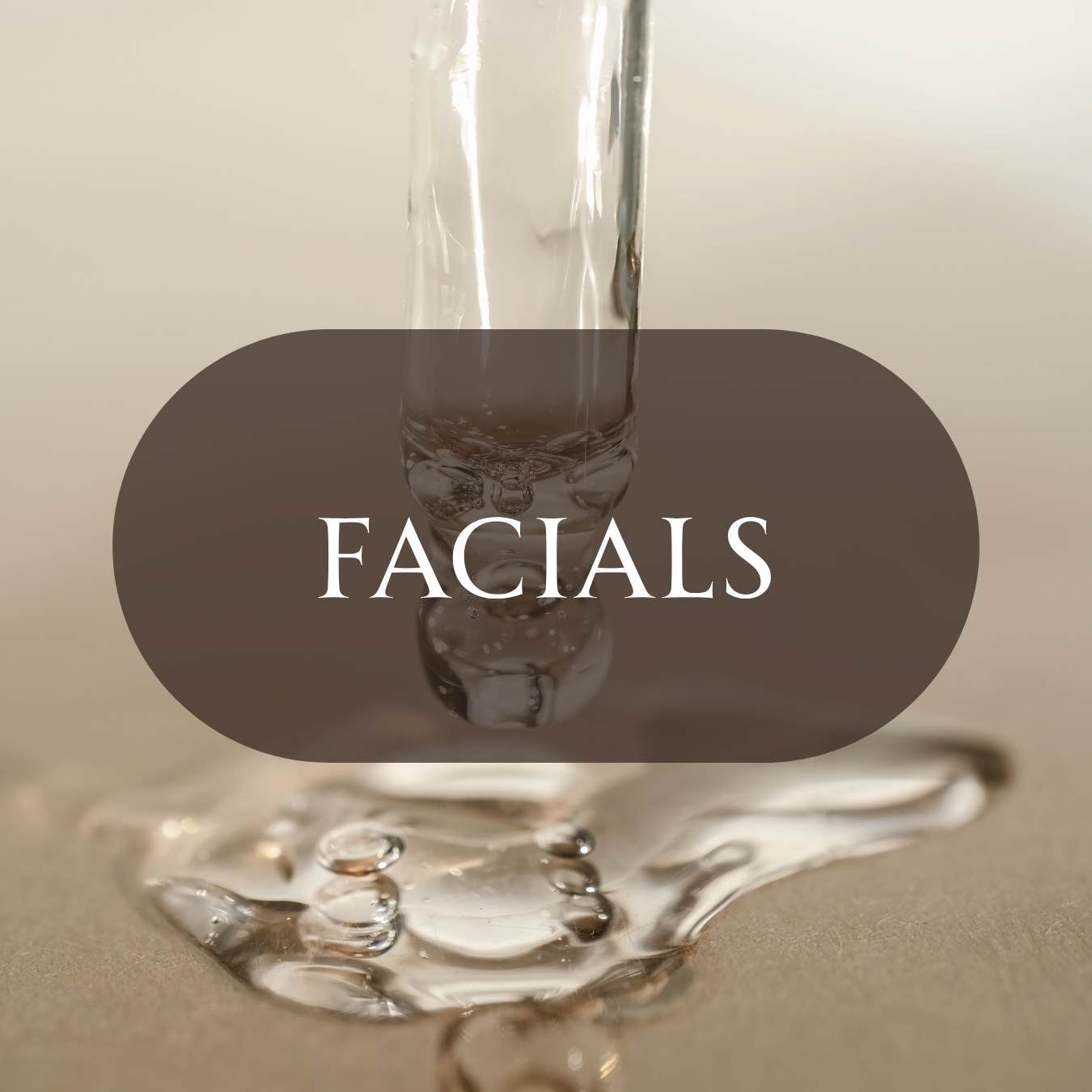 Drop of serum falling from a glass dropper, representing a treatment facial in White Plains, NY